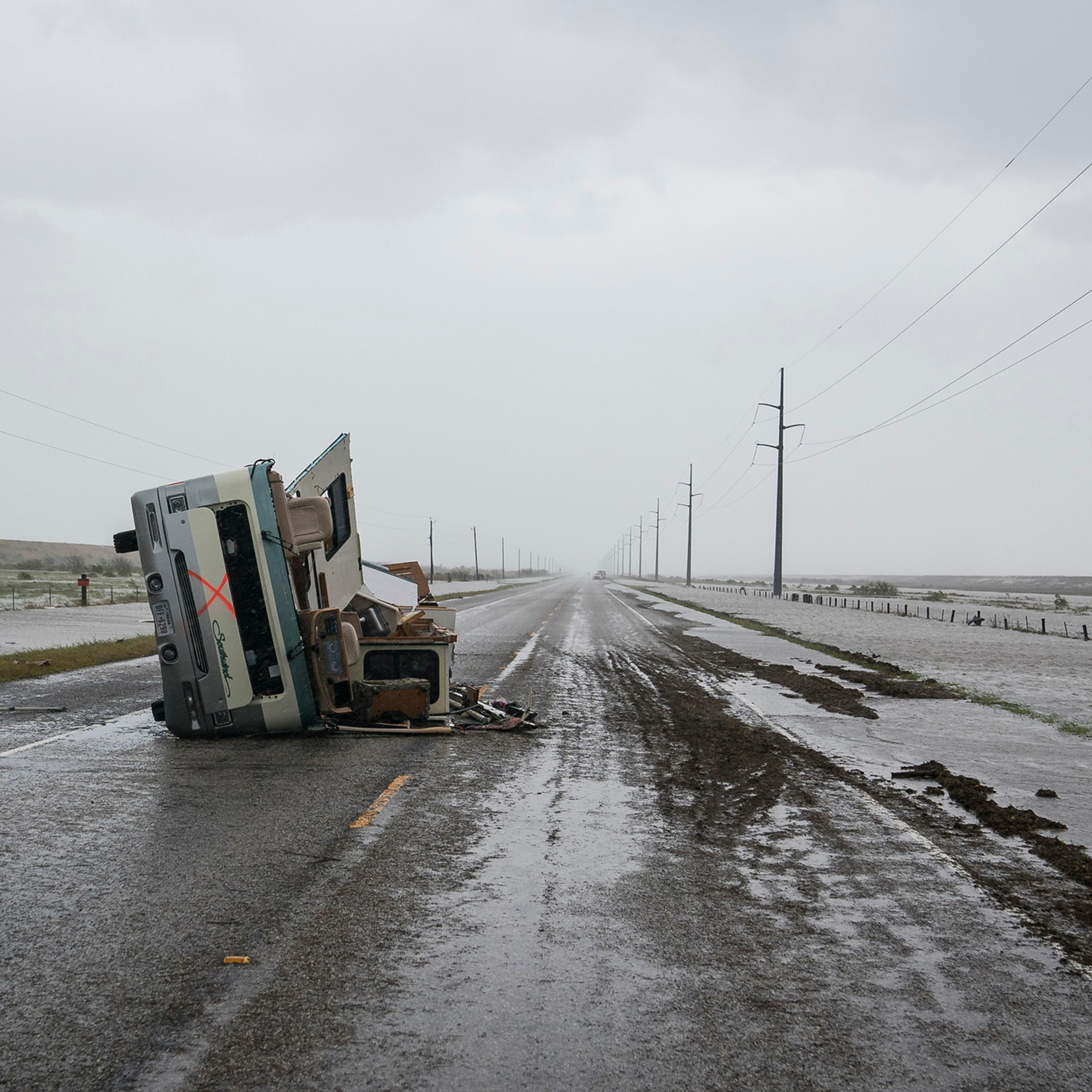 An RV is seen destroyed along the road near City-By-The Sea, TX as Hurricane Harvey hits the Texas coast on Aug 26, 2017.