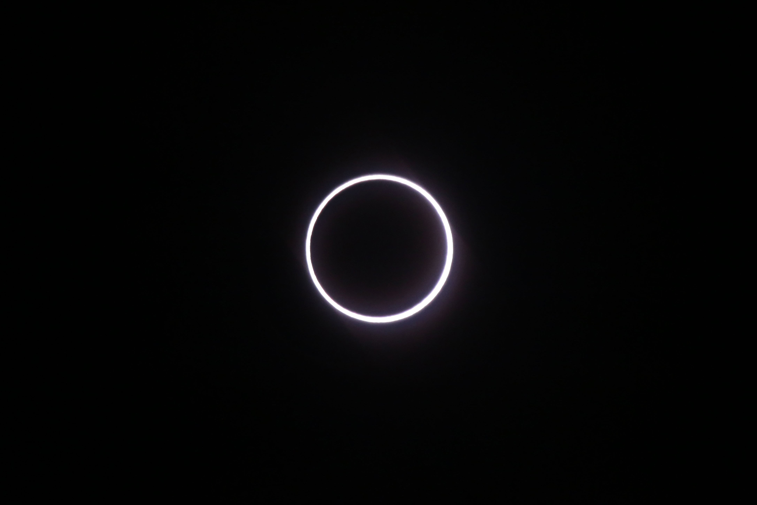 The moon covering the sun, leaving a ring of fire effect around the moon, during an annular solar eclipse over Saint-Louis, on the Indian Ocean island of La Reunion, Sept. 1, 2016.