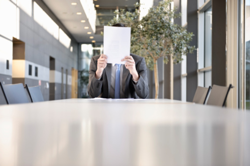 businessman-holding-paper