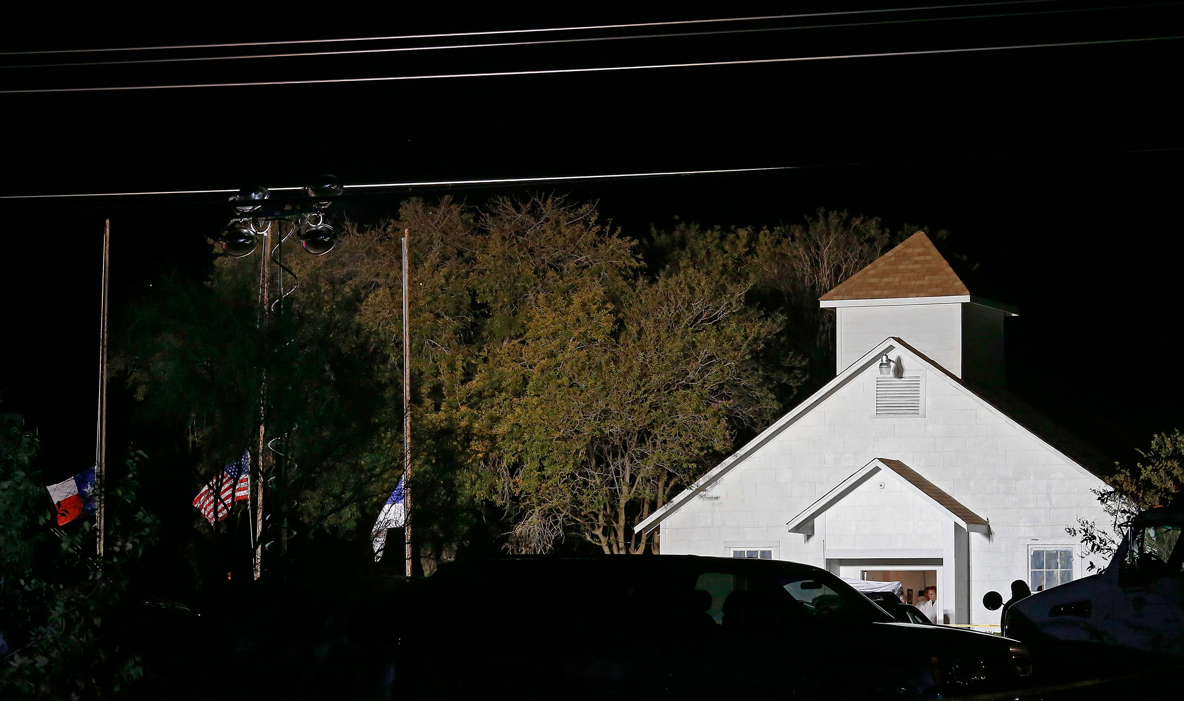 The First Baptist Church in Sutherland Springs is illuminated by raised lamps