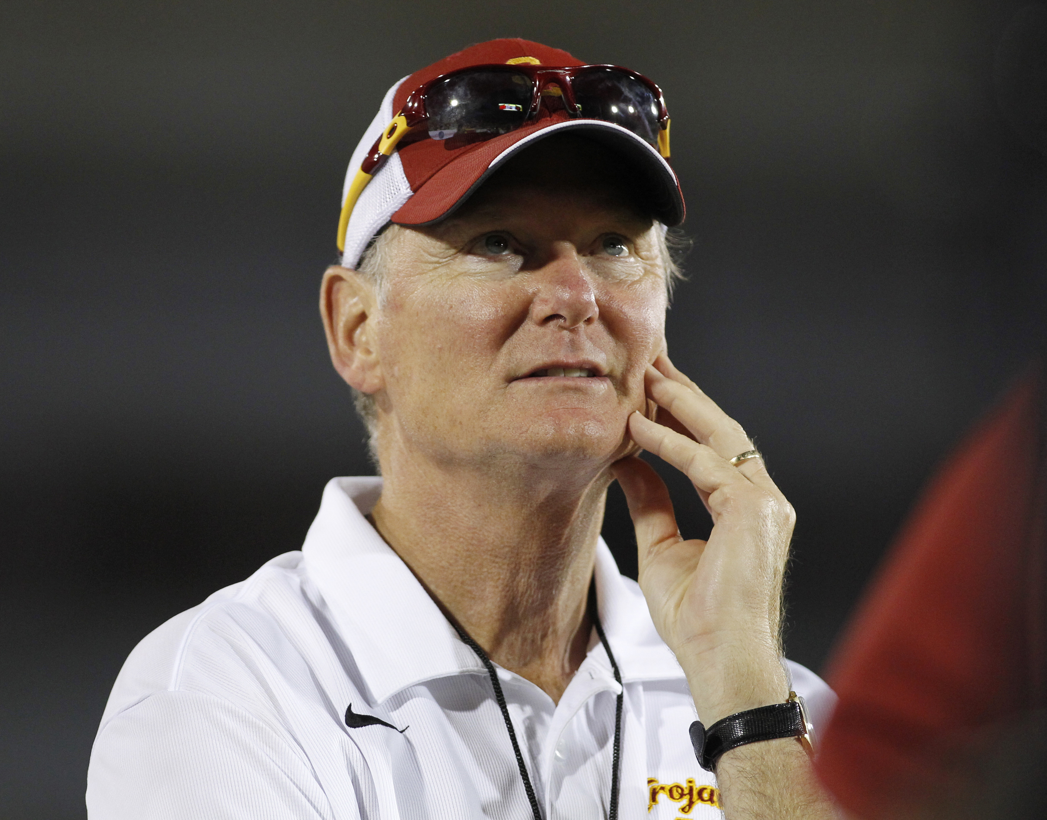 USC Trojans Athletic Director Haden stands on the sidelines during the NCAA football game against the Hawaii Warriors in Los Angeles