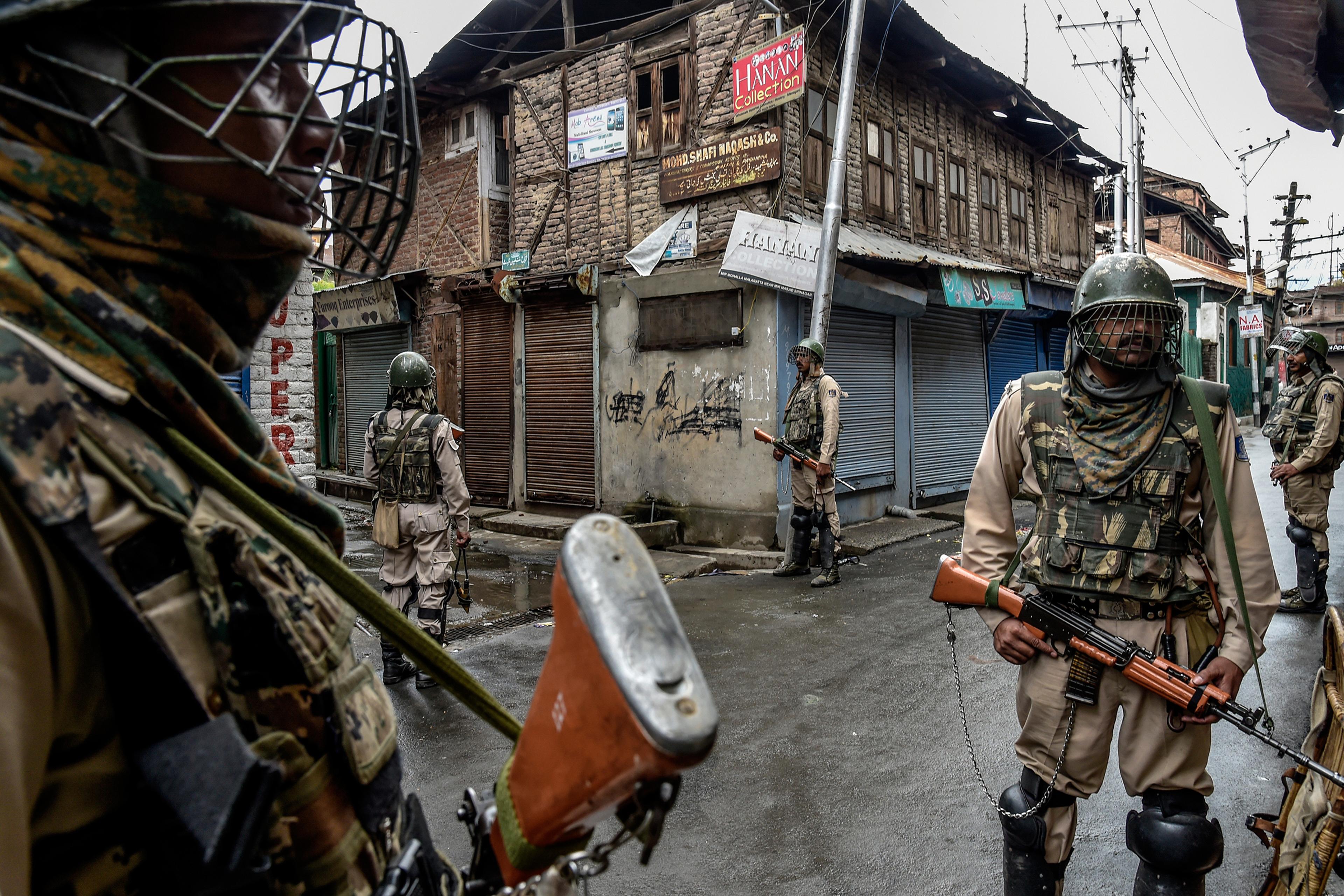 Security forces patrol in Srinagar on Aug. 10.