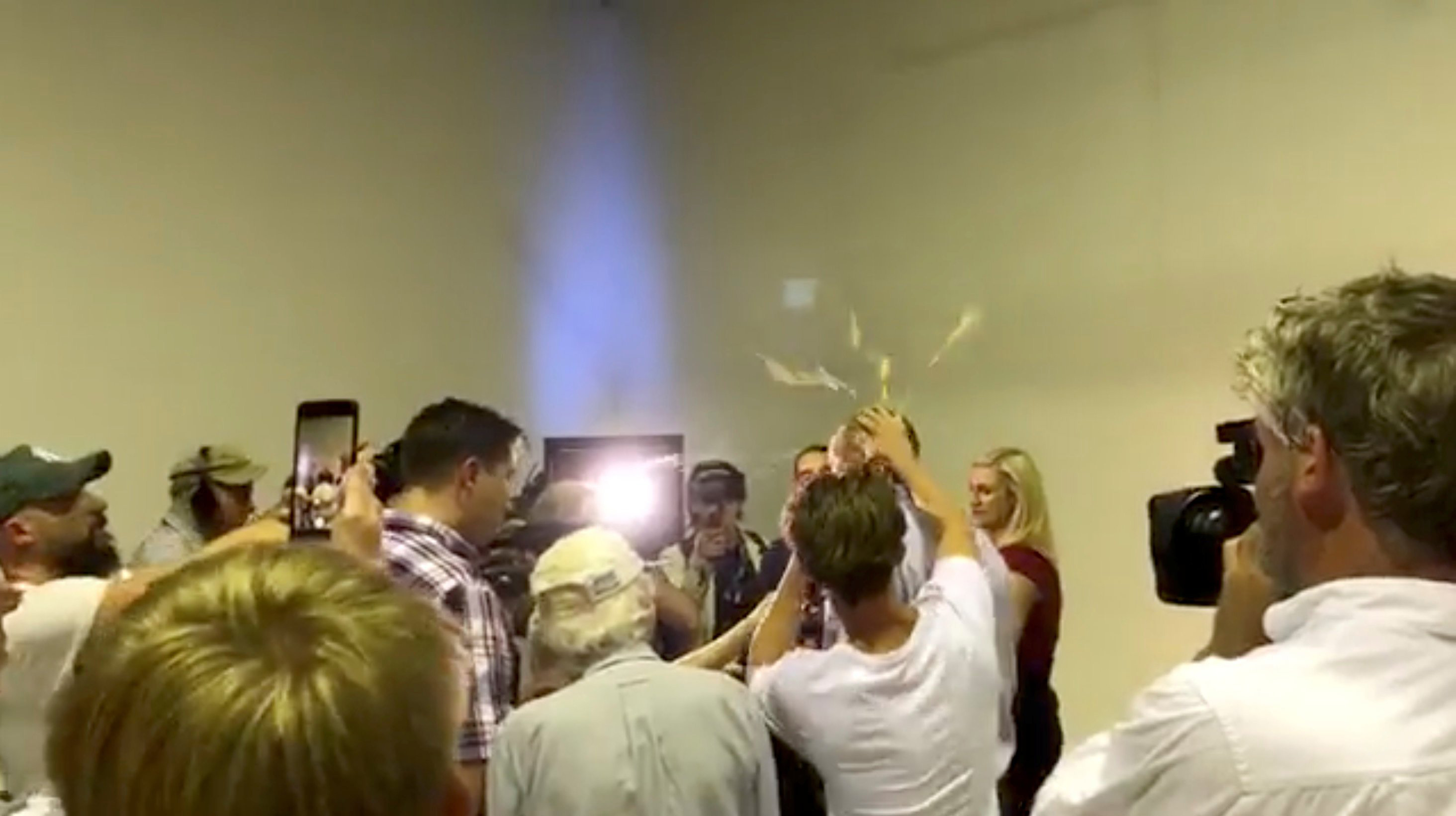 Australian Senator Fraser Anning has an egg smashed on his head while talking to the media in Victoria, Australia