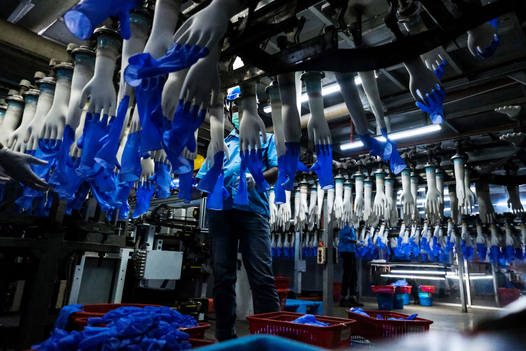 Top Glove, The Worlds Biggest Glovemaker, Raises Money as Virus Fuels Demand
