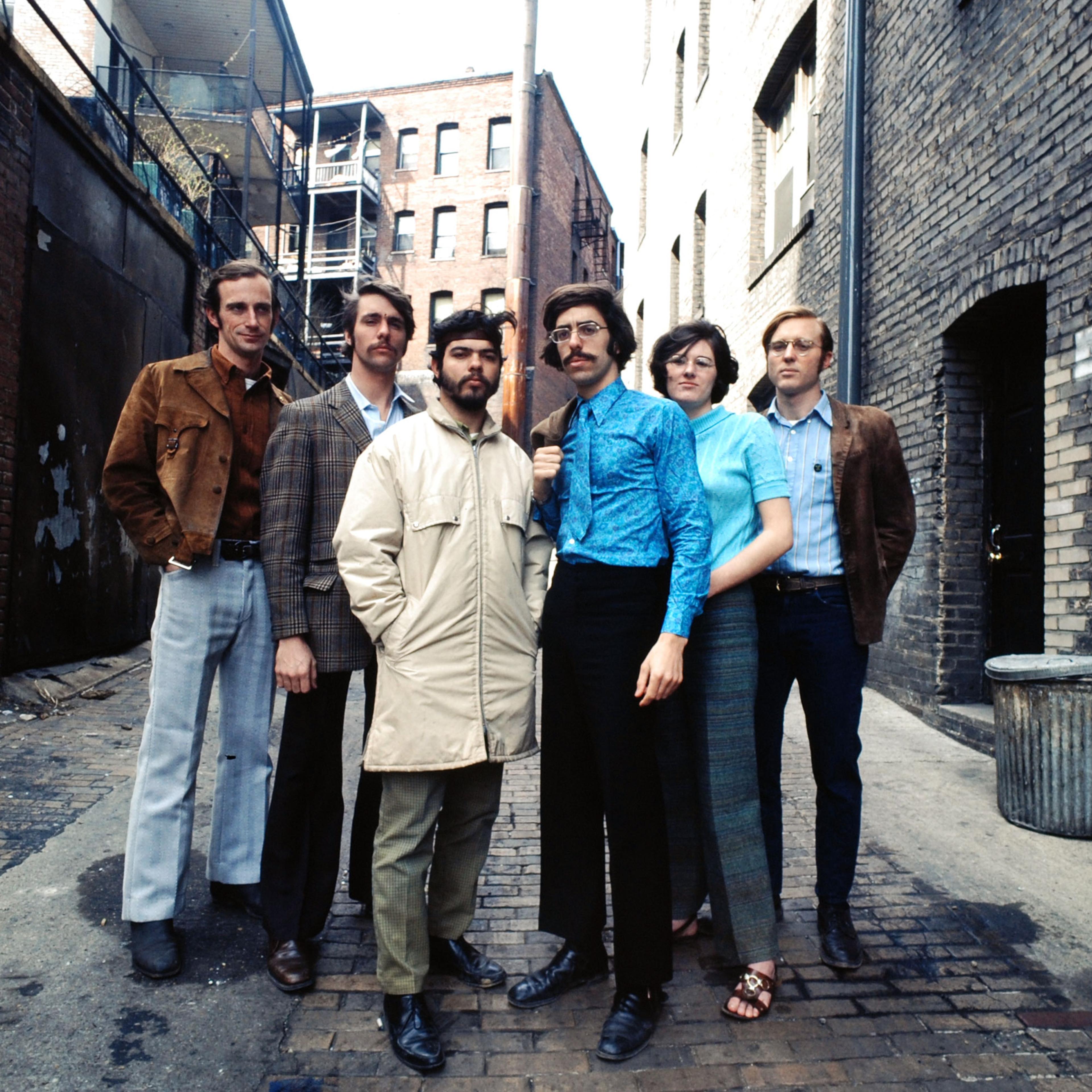 In a Washington D. C. ghetto, key Earth Day staffers (from left) Denis Hayes, Andrew Garling, Arturo Sandoval, Stephen Cotton, Barbara Reid and Bryce Hamilton gather for a group portrait.