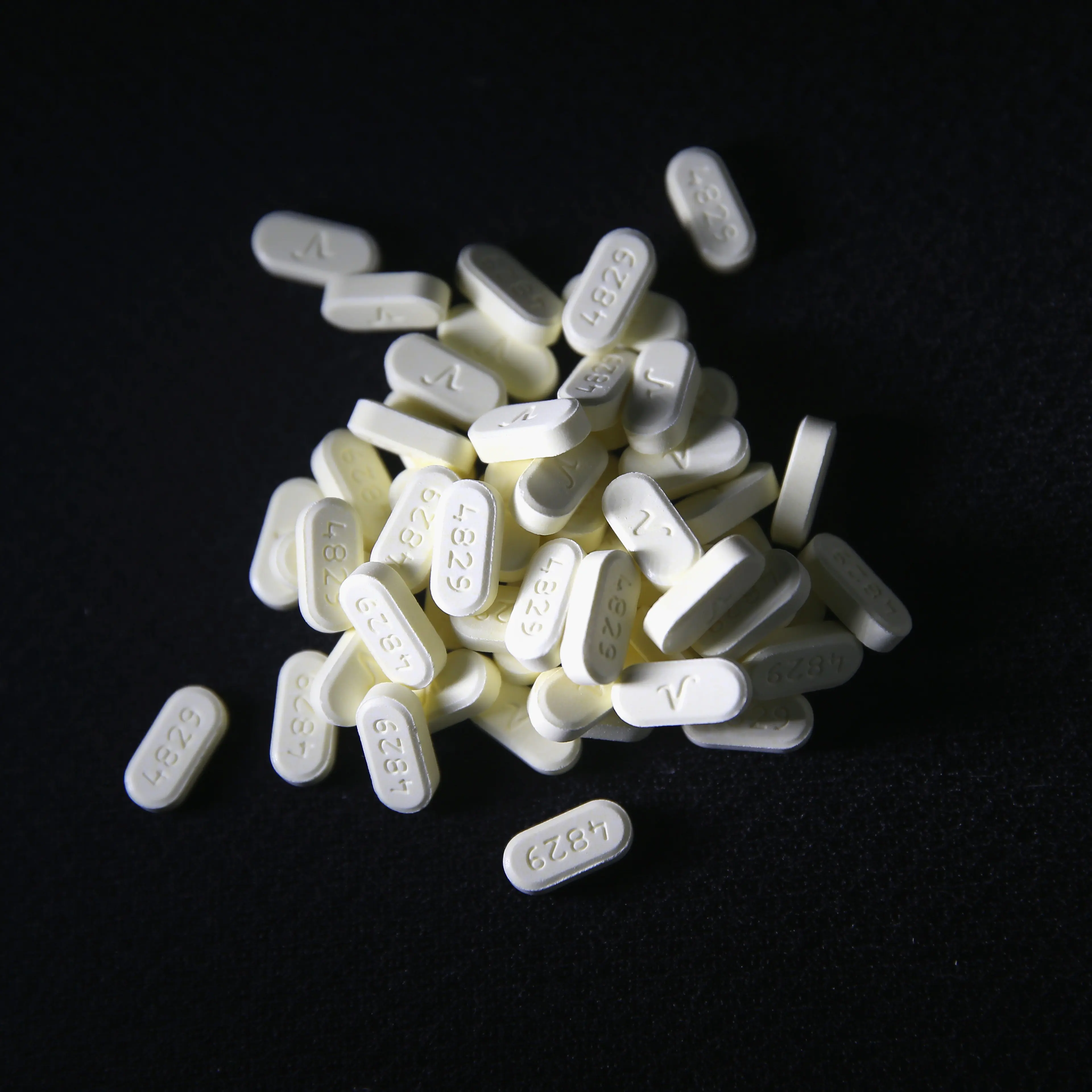 Oxycodone pain pills prescribed for a patient with chronic pain lie on display in Norwich, CT on March 23, 2016.