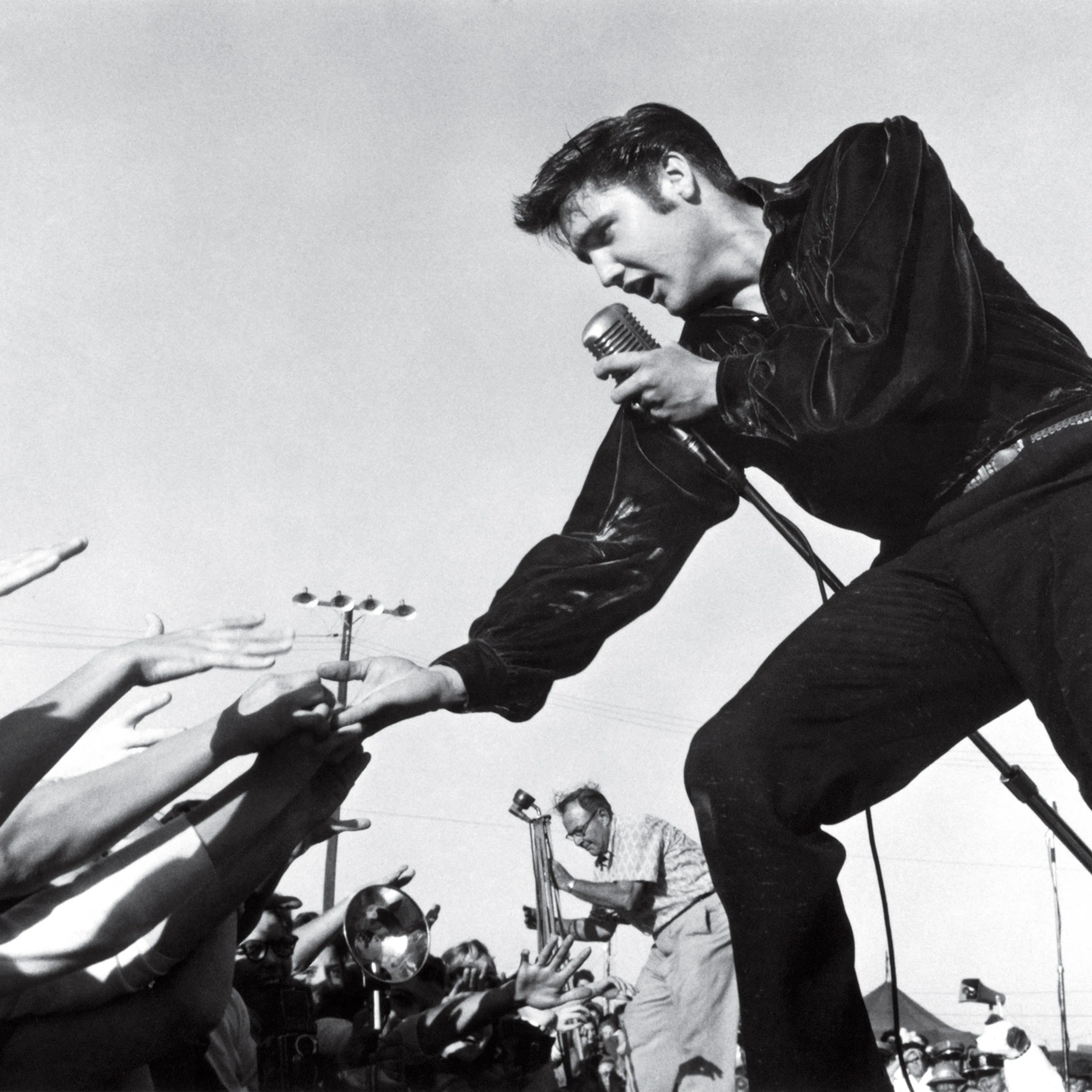 Elvis Presley performing at the Mississippi-Alabama Fair and Dairy Show in 1956 in Tupelo, Miss.