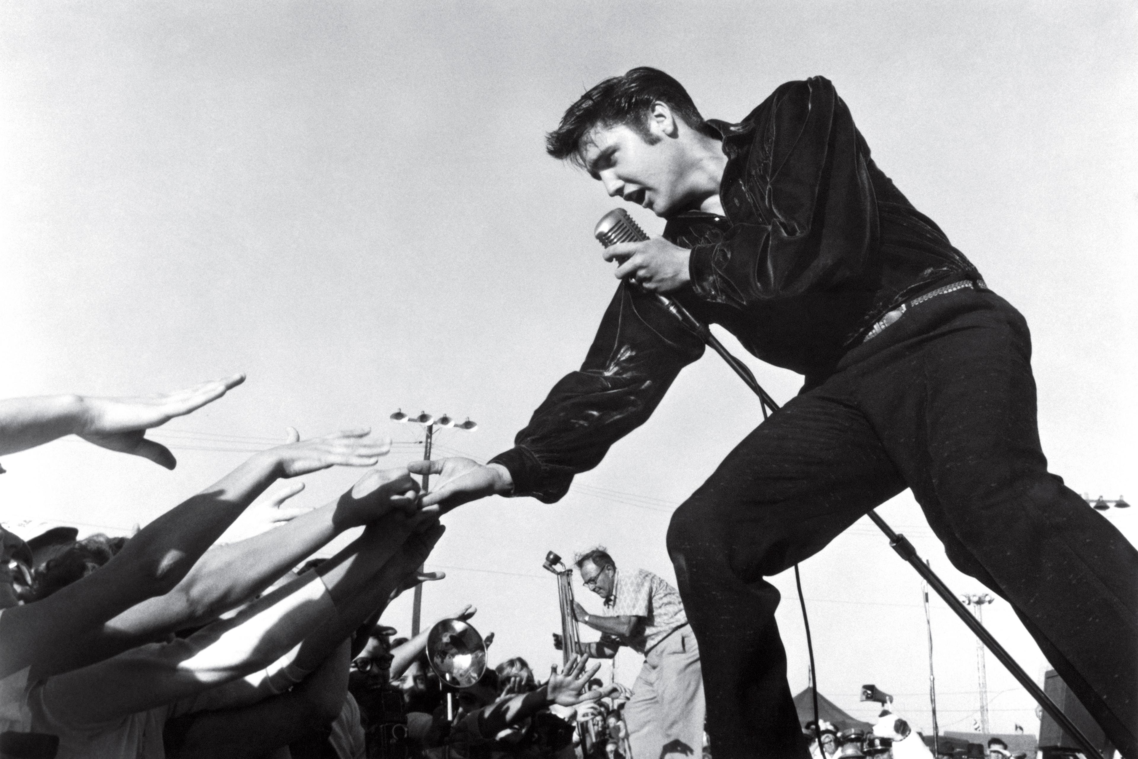 Elvis Presley performing at the Mississippi-Alabama Fair and Dairy Show in 1956 in Tupelo, Miss.