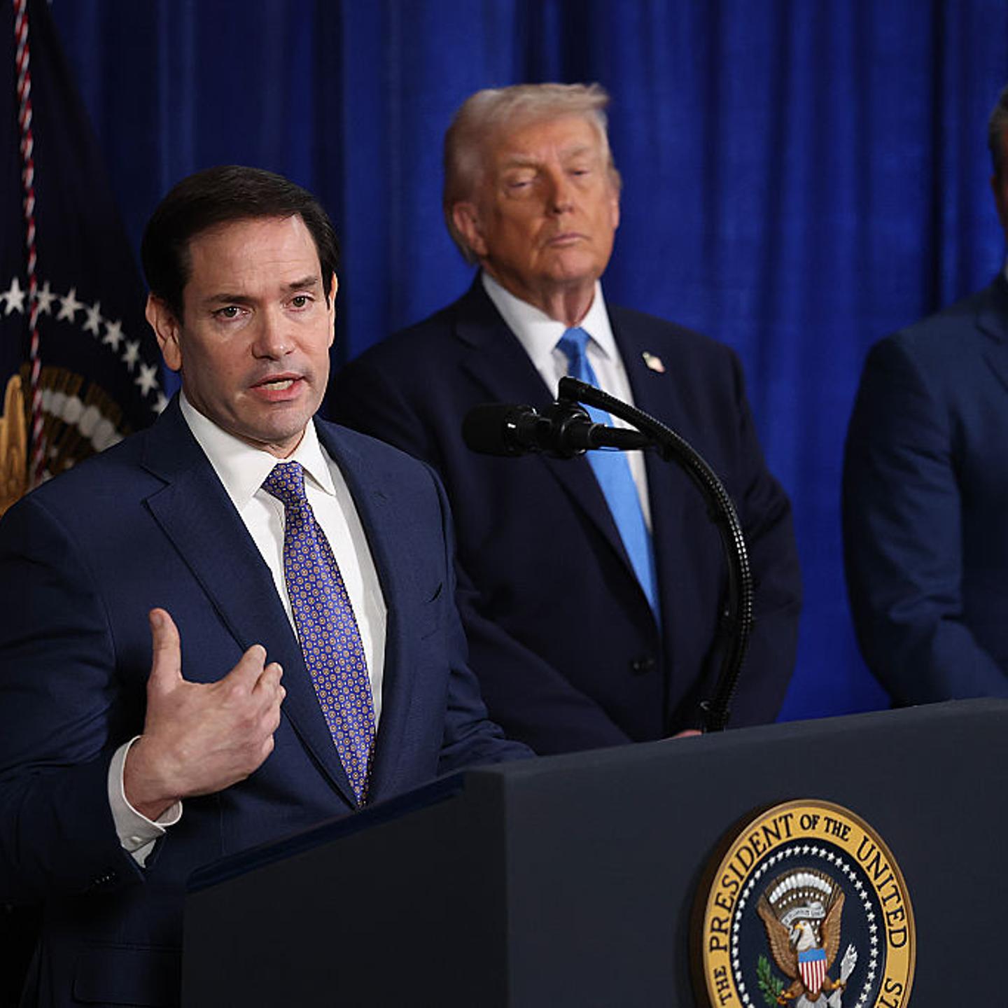 Secretary of State Marco Rubio speaks during a press conference as President Donald Trump and Secretary of War Pete Hegseth listen at Mar-a-Lago club in Palm Beach, Florida, on Jan. 3, 2026.
