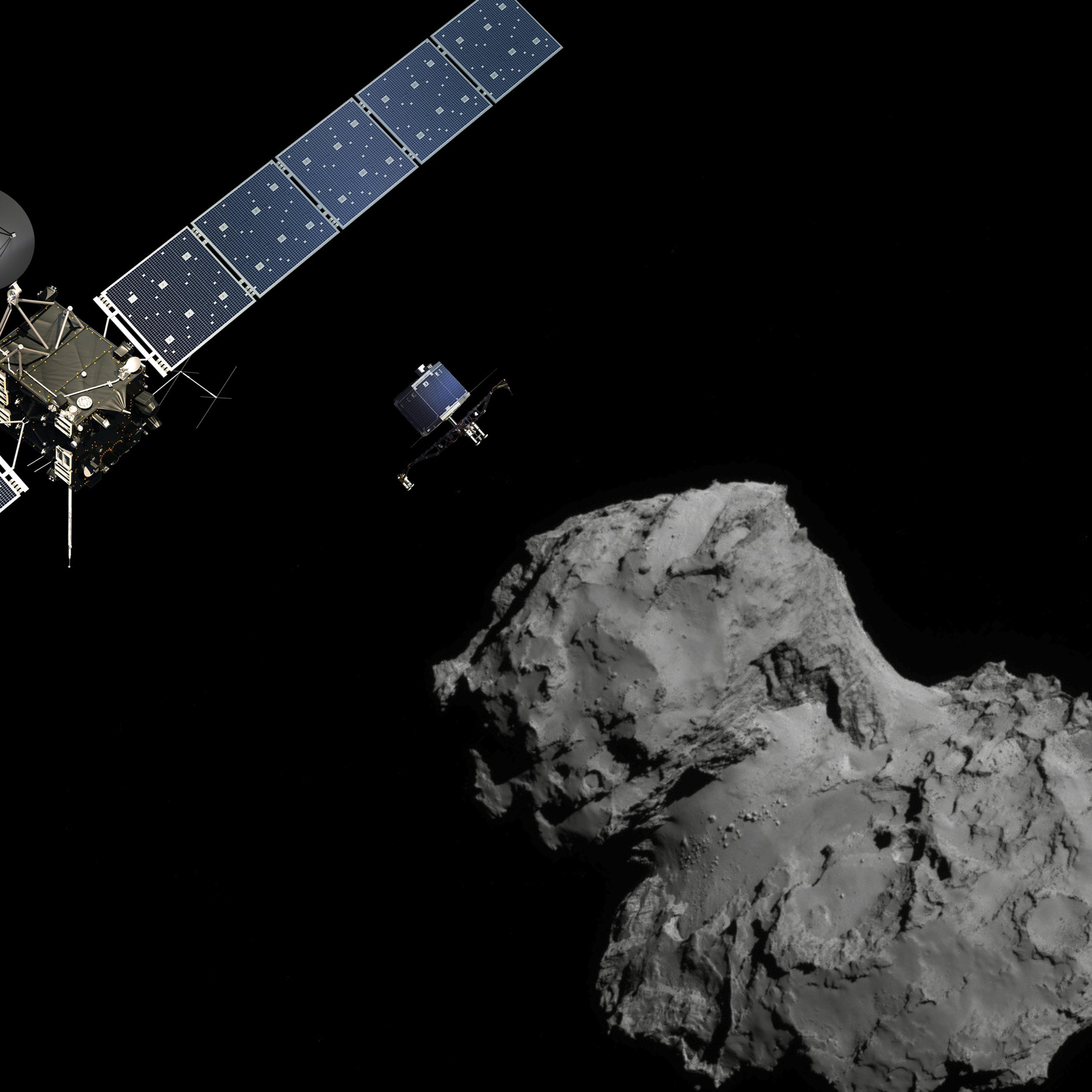 A photo illustration of the Rosetta probe and Philae lander above the 67P/Churyumov-Gerasimenko comet.