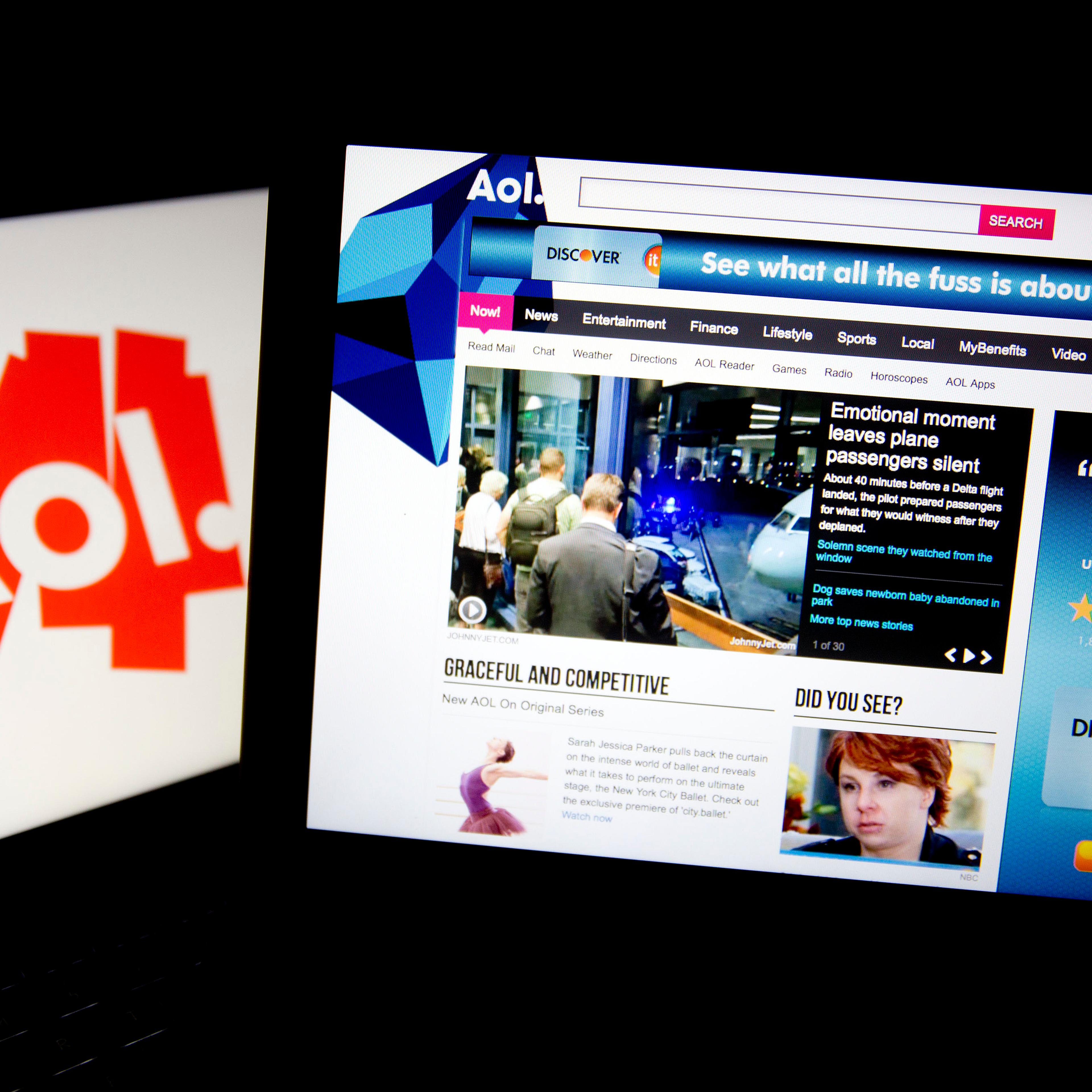 The Aol.com website and Aol Inc. logo on laptop computers.