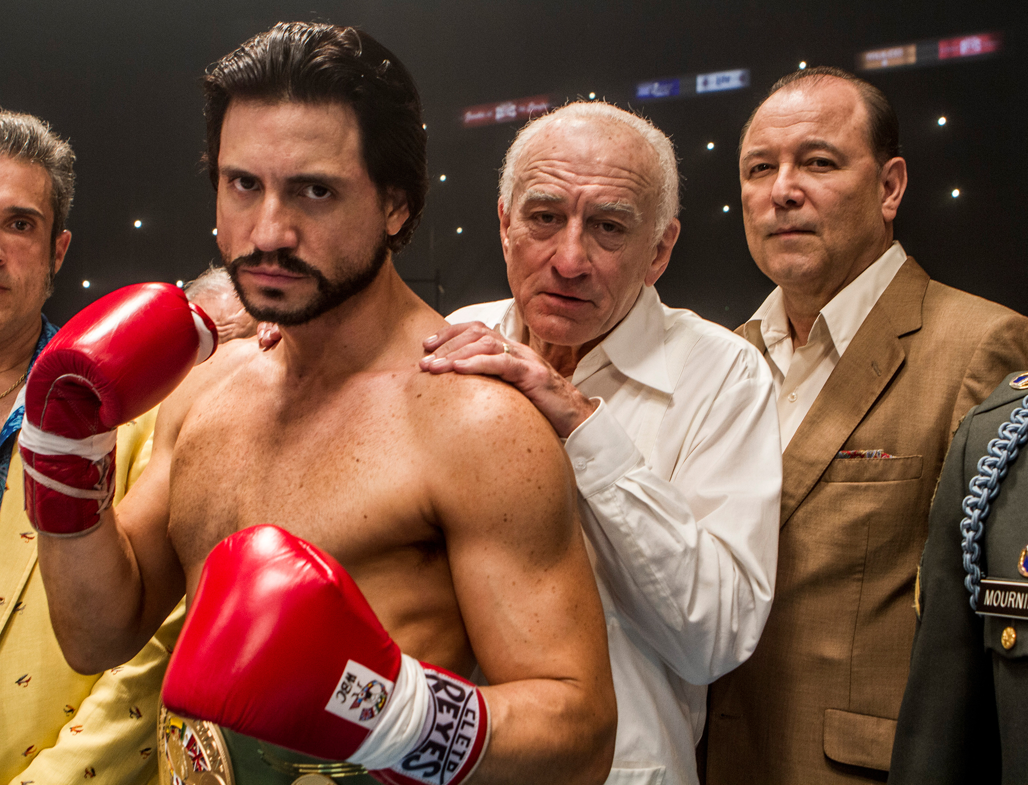 Édgar Ramírez, Robert De Niro and Rubén Blades in Hands of Stone.
