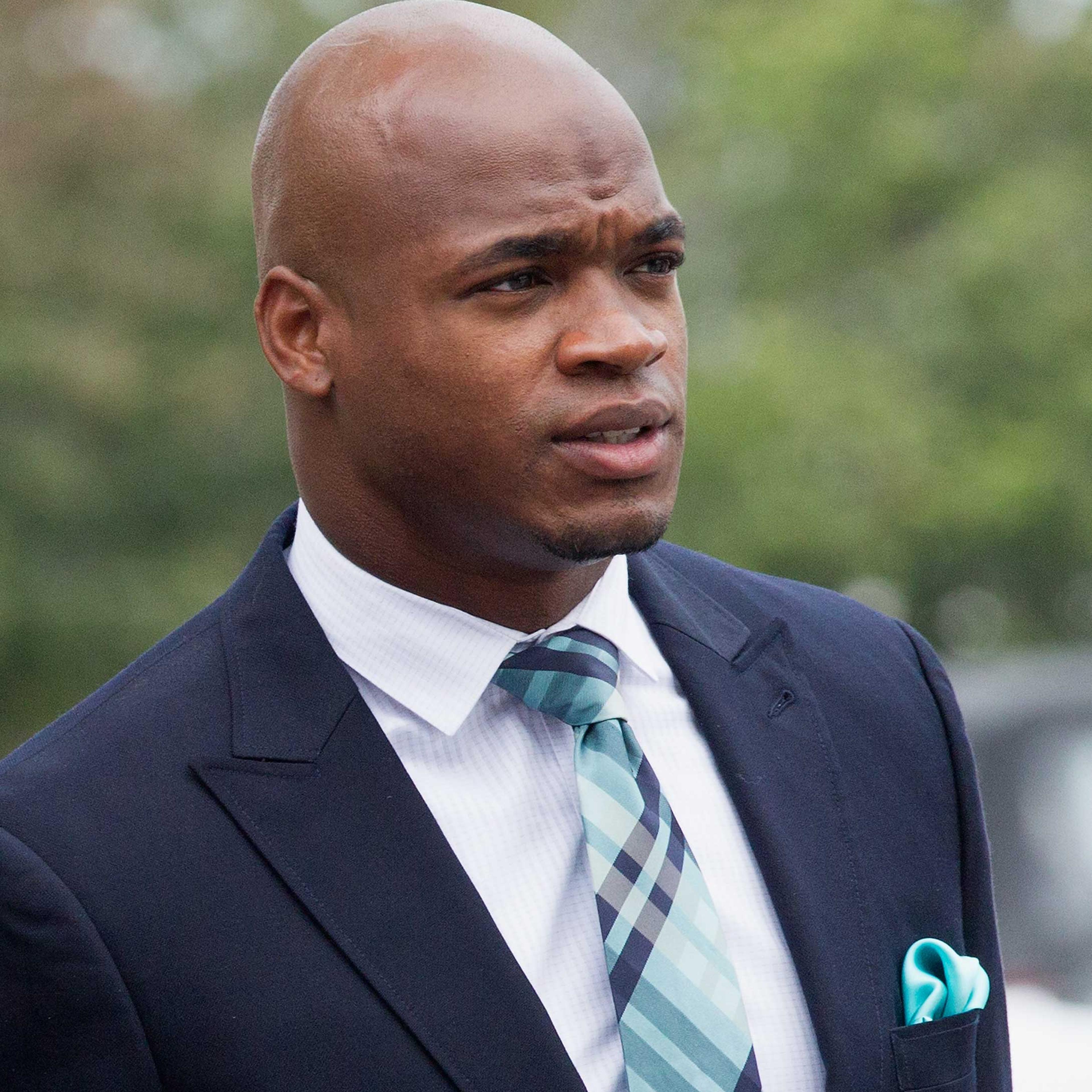 Adrian Peterson of the Minnesota Vikings arrives for a court hearing on charges of child abuse at the Montgomery County Courthouse on Nov. 4, 2014 in Conroe, Texas.
