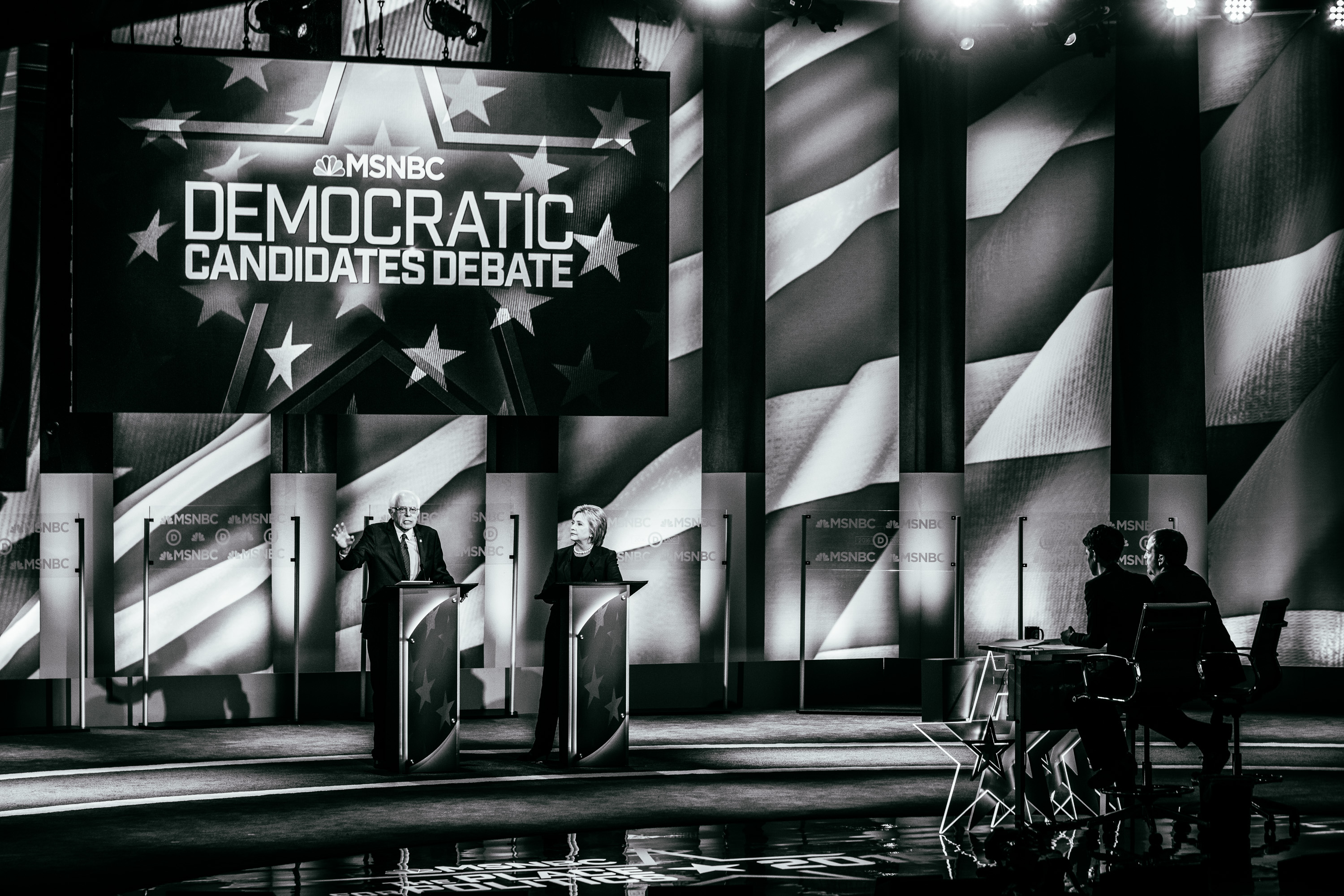 Democratic presidential candidates former Secretary of State Hillary Clinton and U.S. Sen. Bernie Sanders (I-VT) appear at a Democratic debate at the University of New Hampshire on Feb. 4, 2016 in Durham, N.H.