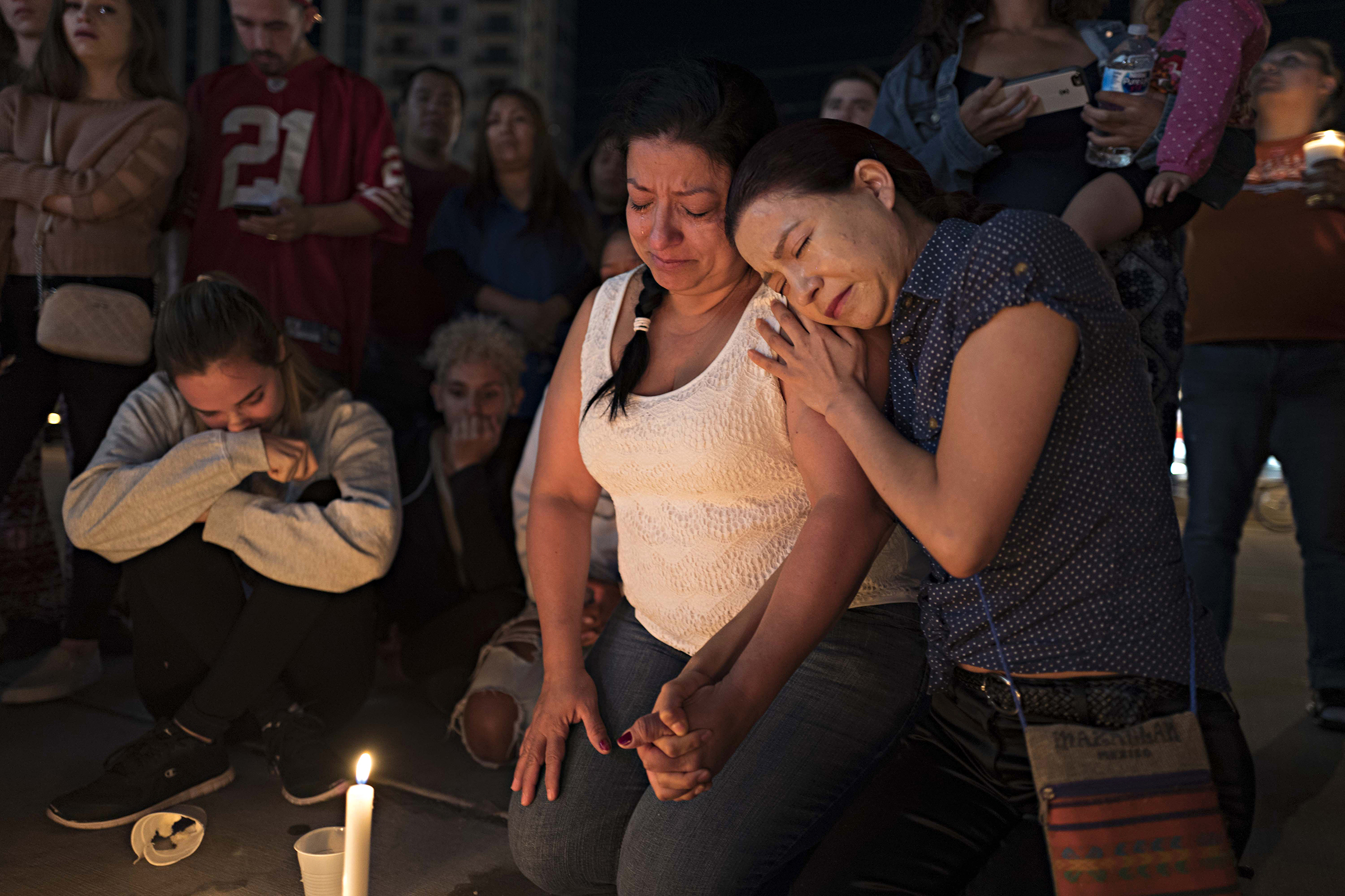 A street vigil held at Las Vegas Boulevard and Sahara Avenue, October 2, 2017.  photograph by Matt Stuart—Magnum for TIME