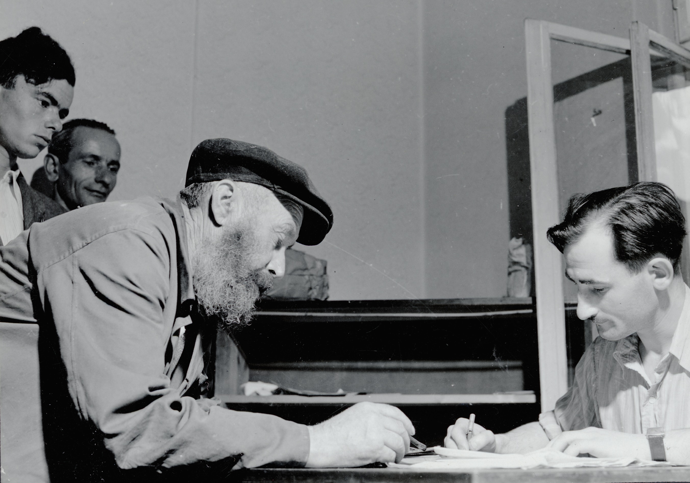Jewish survivors registering at the employment service of the Central Committee of Jews in Poland, Klodzko, 1946. 