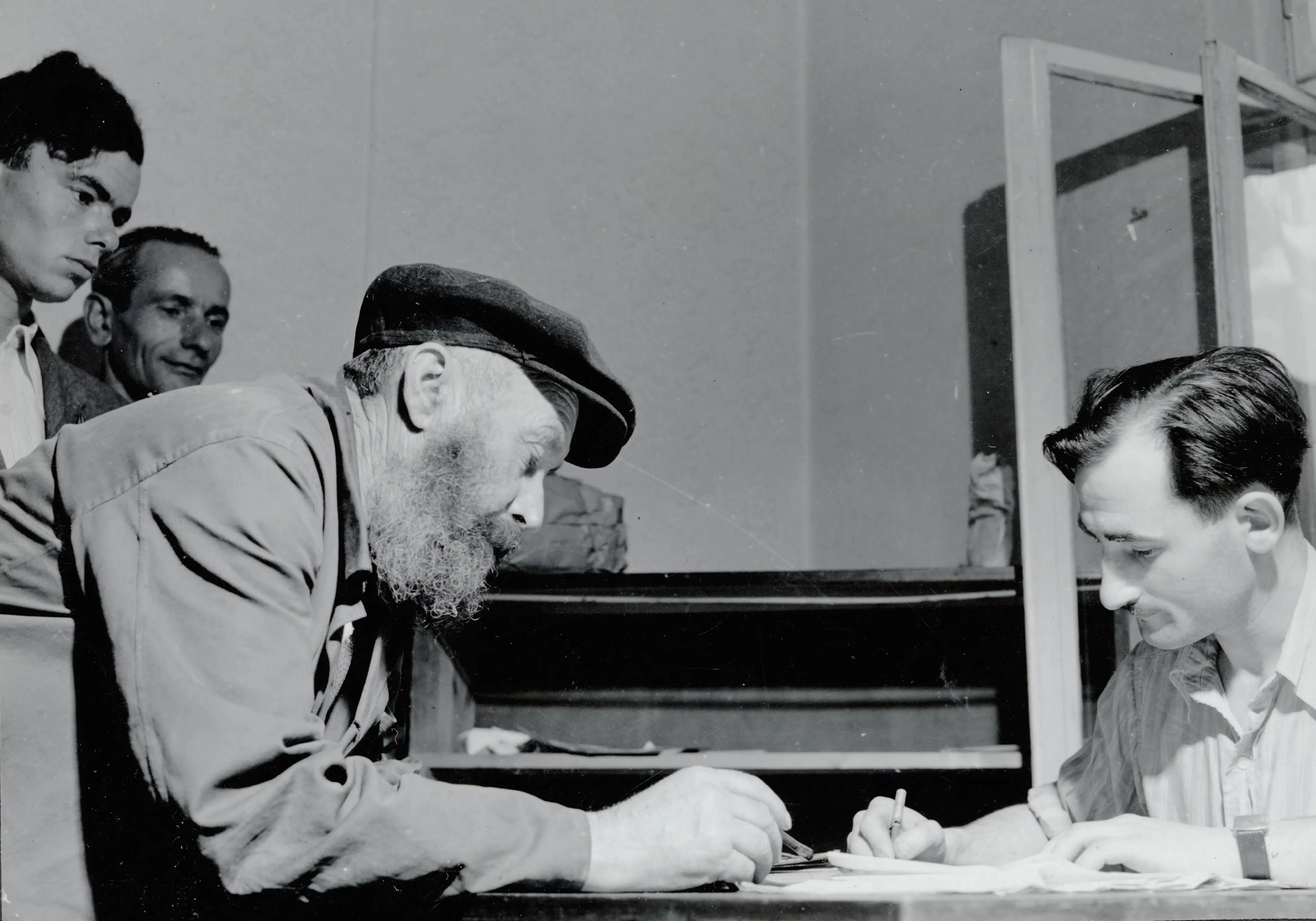 Jewish survivors registering at the employment service of the Central Committee of Jews in Poland, Klodzko, 1946.