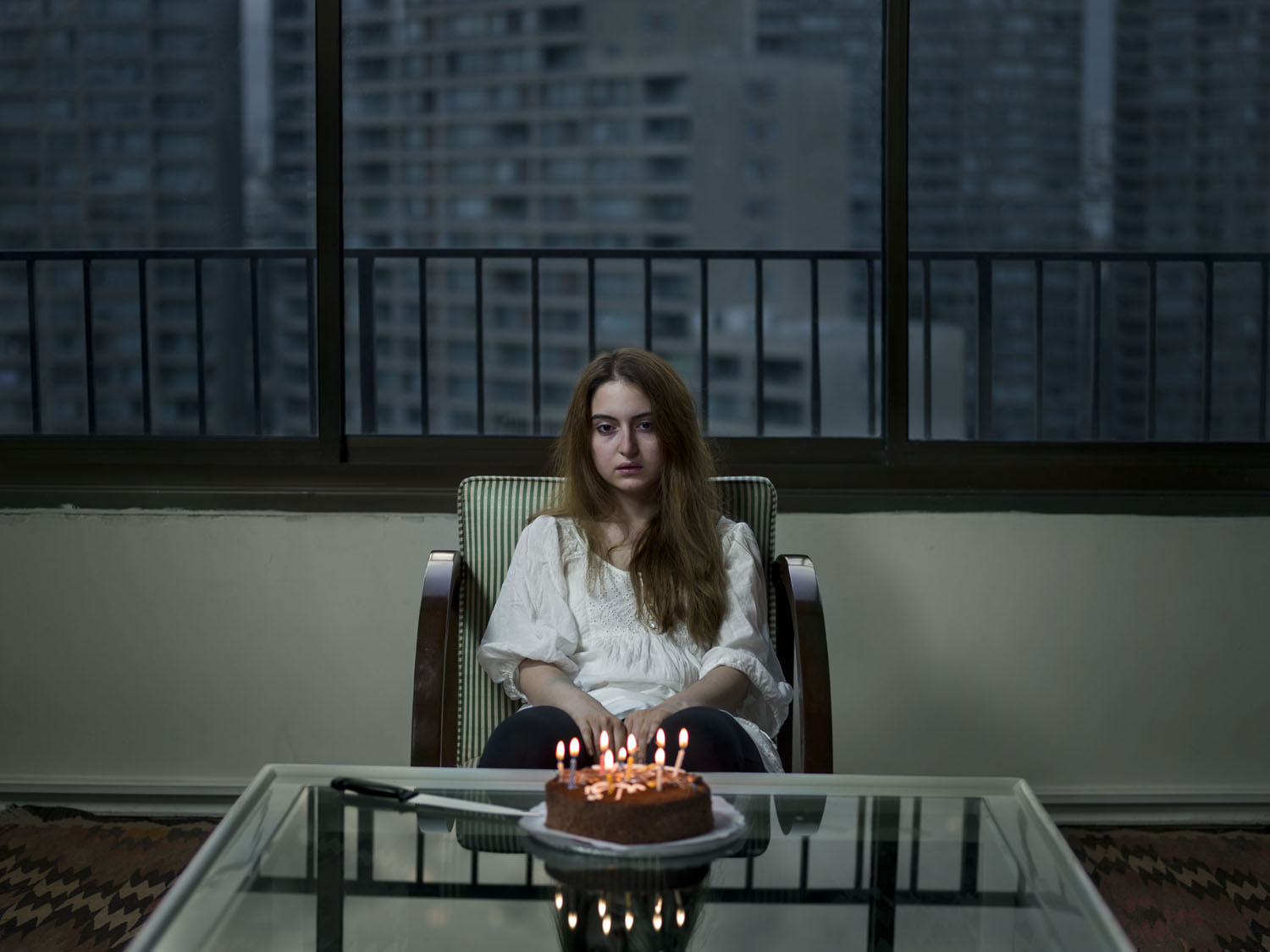 "The project was my desire to look deeply into the lives of those around me who I have known for over ten years and who live in my building," Tavakolian explains. "I wanted to bring to life the story of a nation of middle class youths who are everyday battling with themselves, their isolated conformed society, their lack of hope for the future and each of their individual stories."