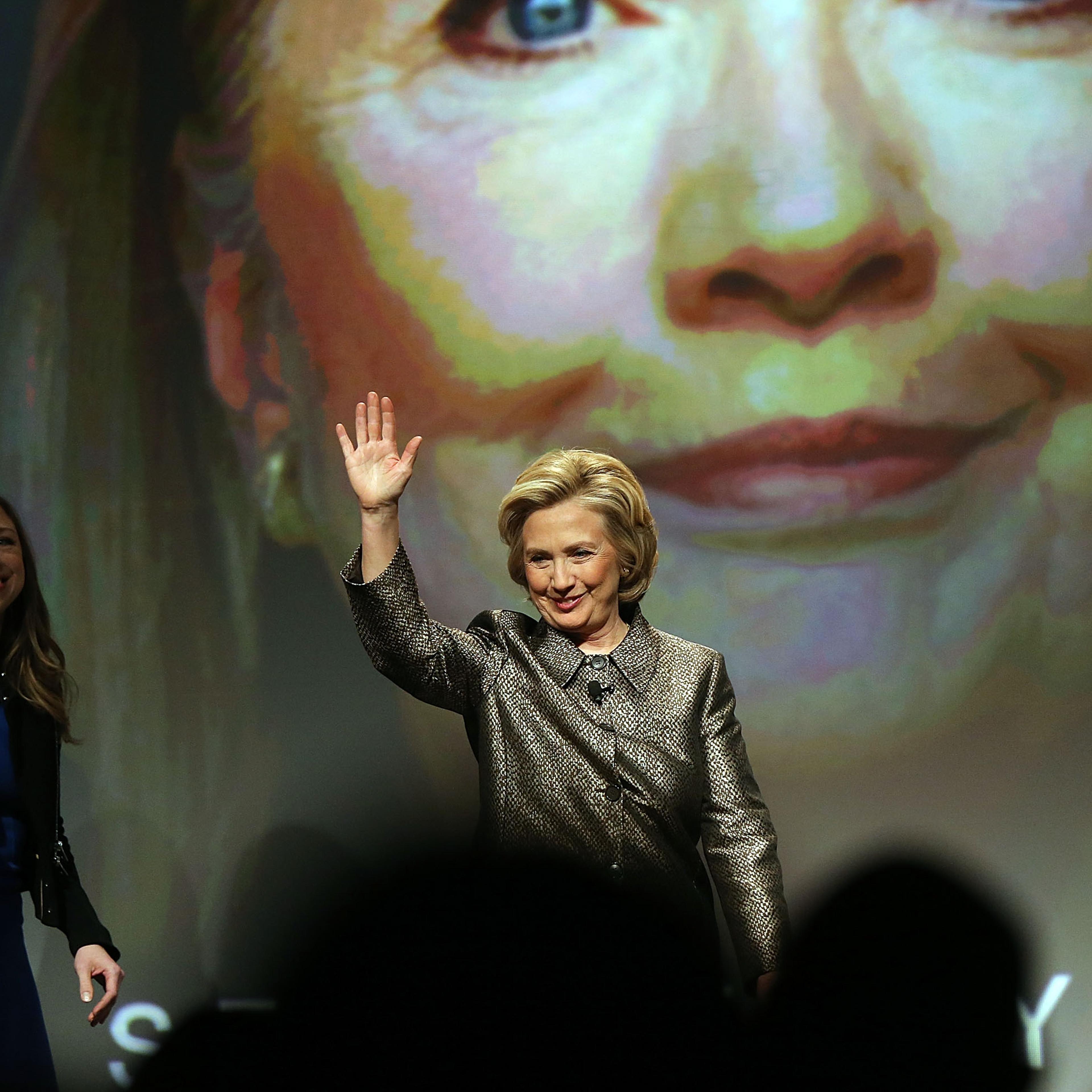 Former Secretary of State Hillary Rodham Clinton walks onto the stage for the official release of the No Ceilings Full Participation Report on March 9, 2015 in New York City.