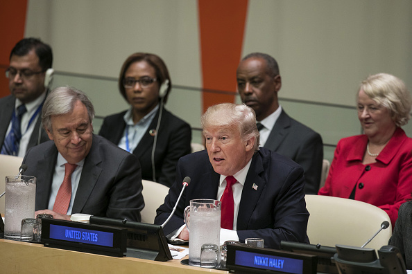 U.S. President Donald Trump, center, speaks as Antonio Guterres, United Nations (UN) secretary general, left, listens during a panel discussion at the UN General Assembly meeting in New York, U.S., on Monday, Sept. 18, 2017.