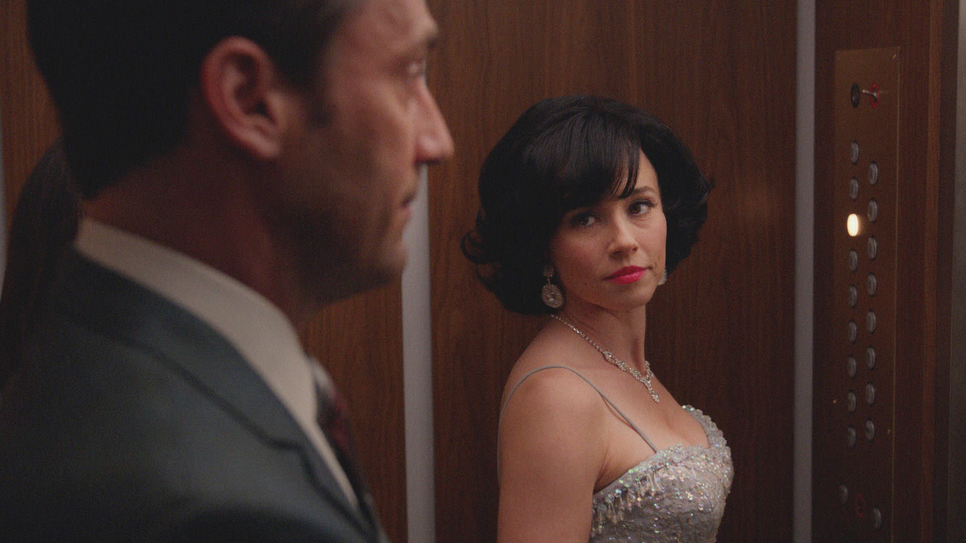Jon Hamm as Don Draper and Linda Cardellini as Sylvia Rosen - Mad Men _ Season 7B, Episode 9 - Photo Credit: Courtesy of AMC