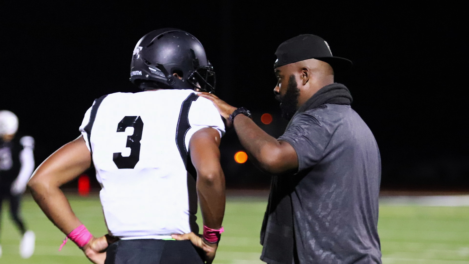 Roy Johnson with a Bishop Sycamore player