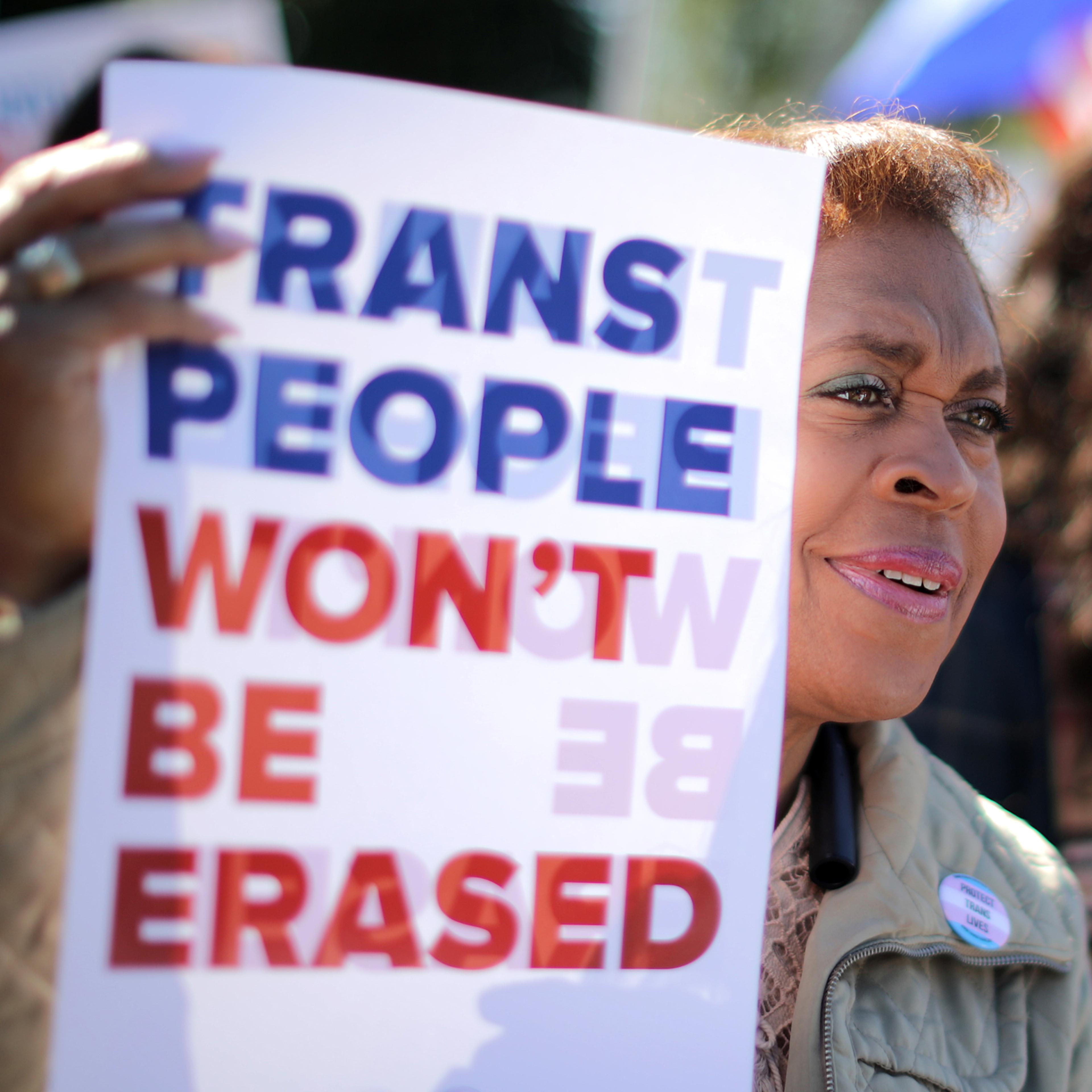 Activists from the National Center for Transgender Equality, partner organizations and their supporters rally in front of the White House Oct. 22, 2018 in Washington, D.C.