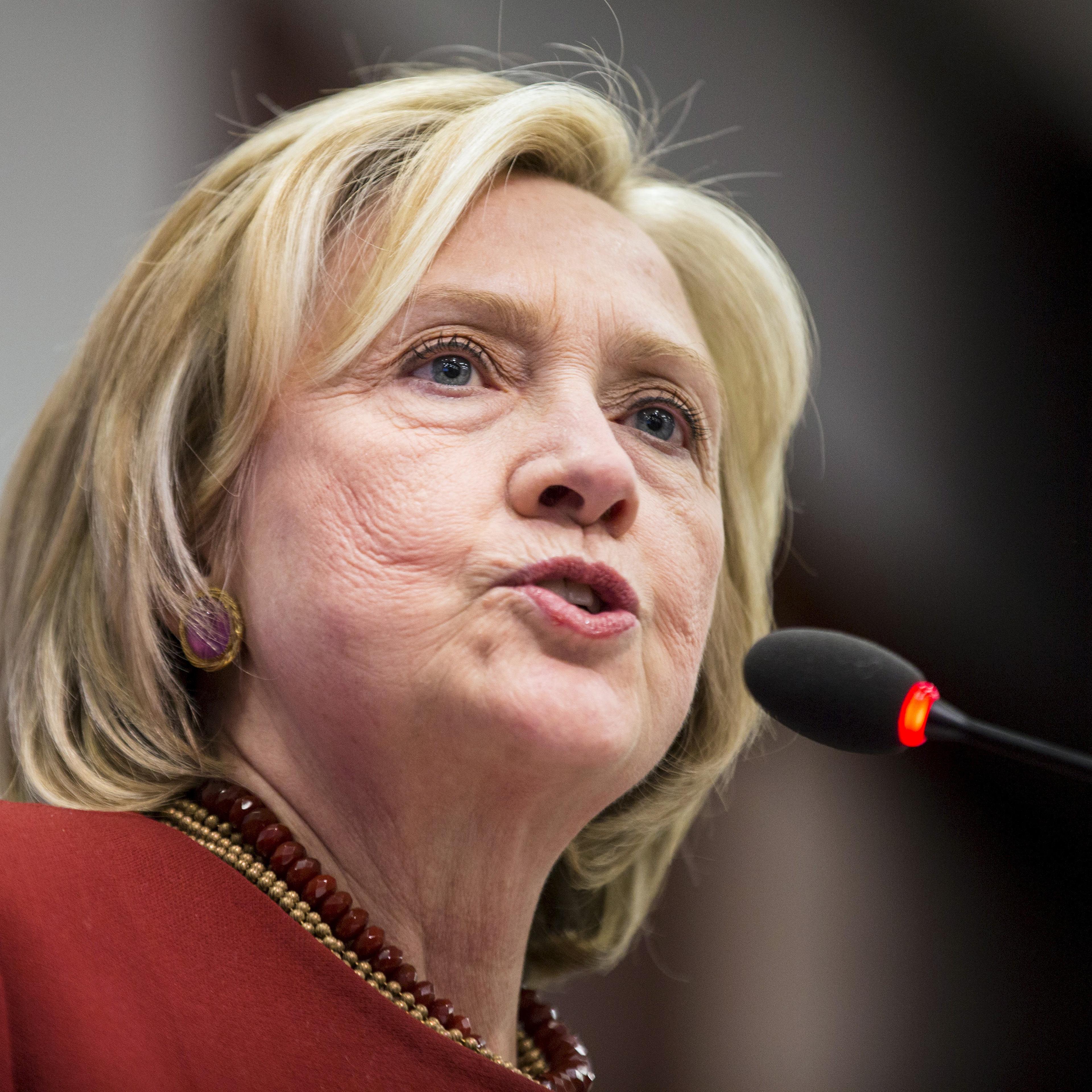Hillary Clinton delivers remarks during the 2015 Toner Prize for Excellence in Political Reporting award in Washington