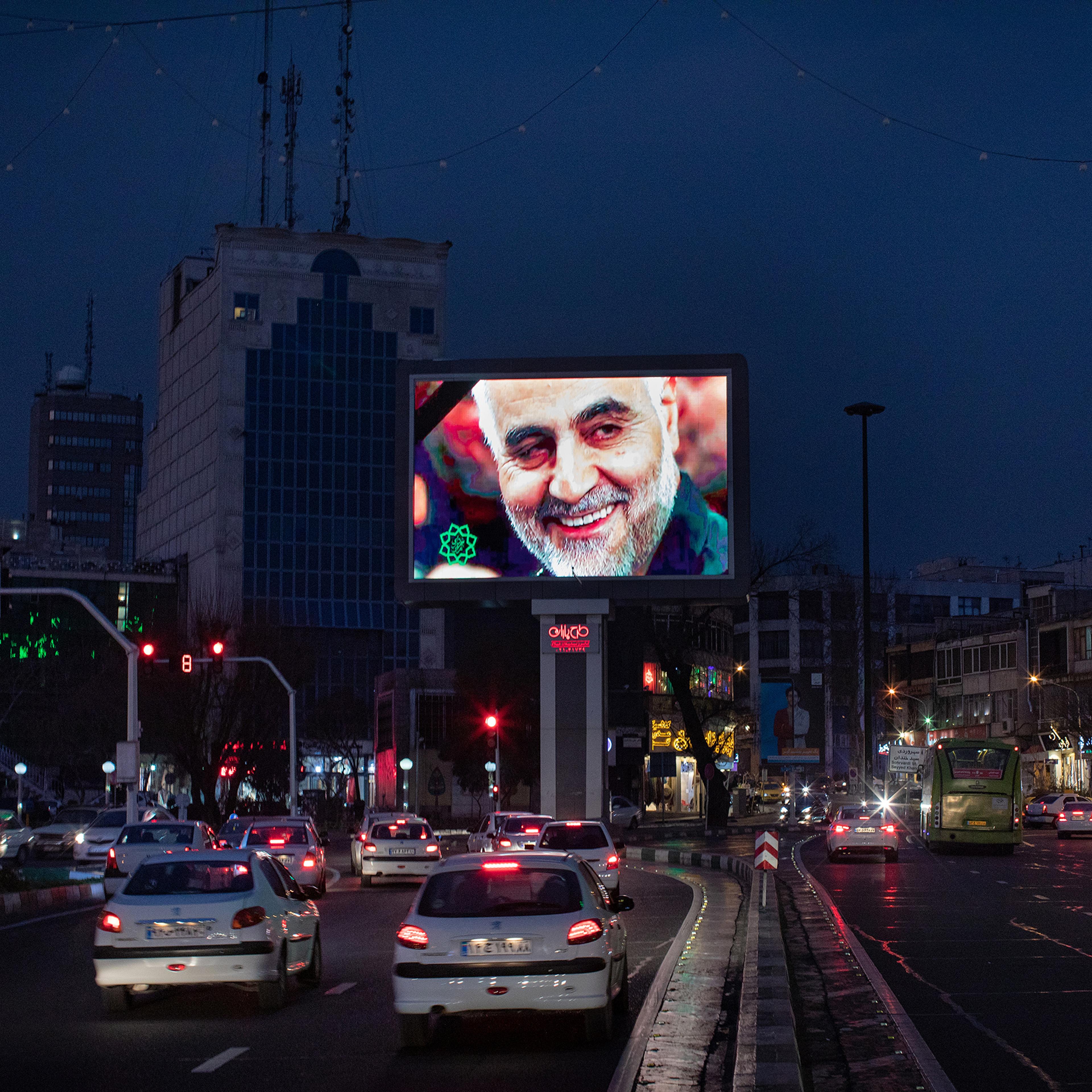 As the evening traffic unfolds in Tehran, a giant digital billboard in Haft-e Tir square displays an image of Maj. Gen. Qasem Soleimani, following his killing in Baghdad, on Jan. 3.