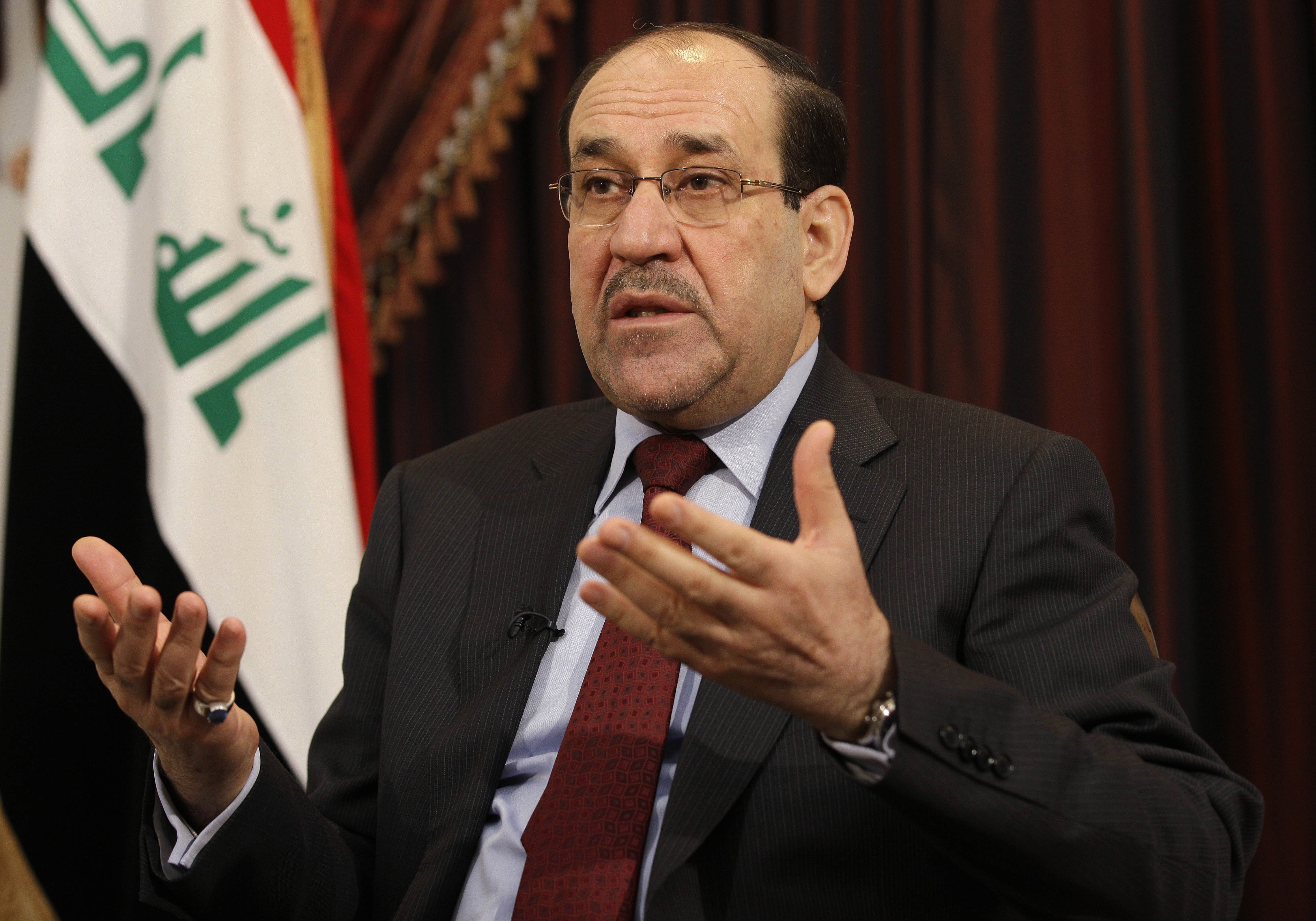 Iraq's Prime Minister Nouri al-Maliki speaks during an interview with The Associated Press in Baghdad, Iraq on December 3, 2011.