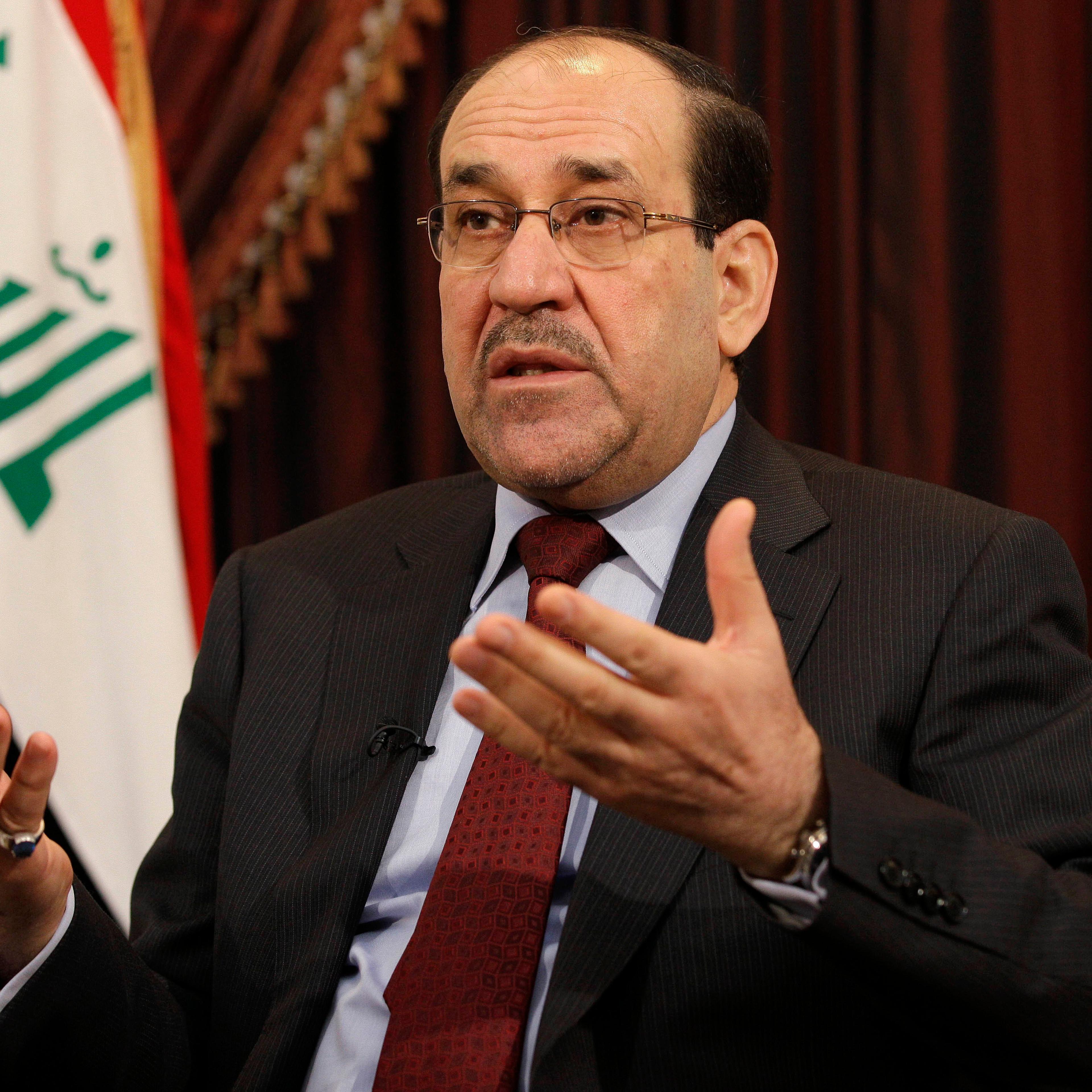 Iraq's Prime Minister Nouri al-Maliki speaks during an interview with The Associated Press in Baghdad, Iraq on December 3, 2011.