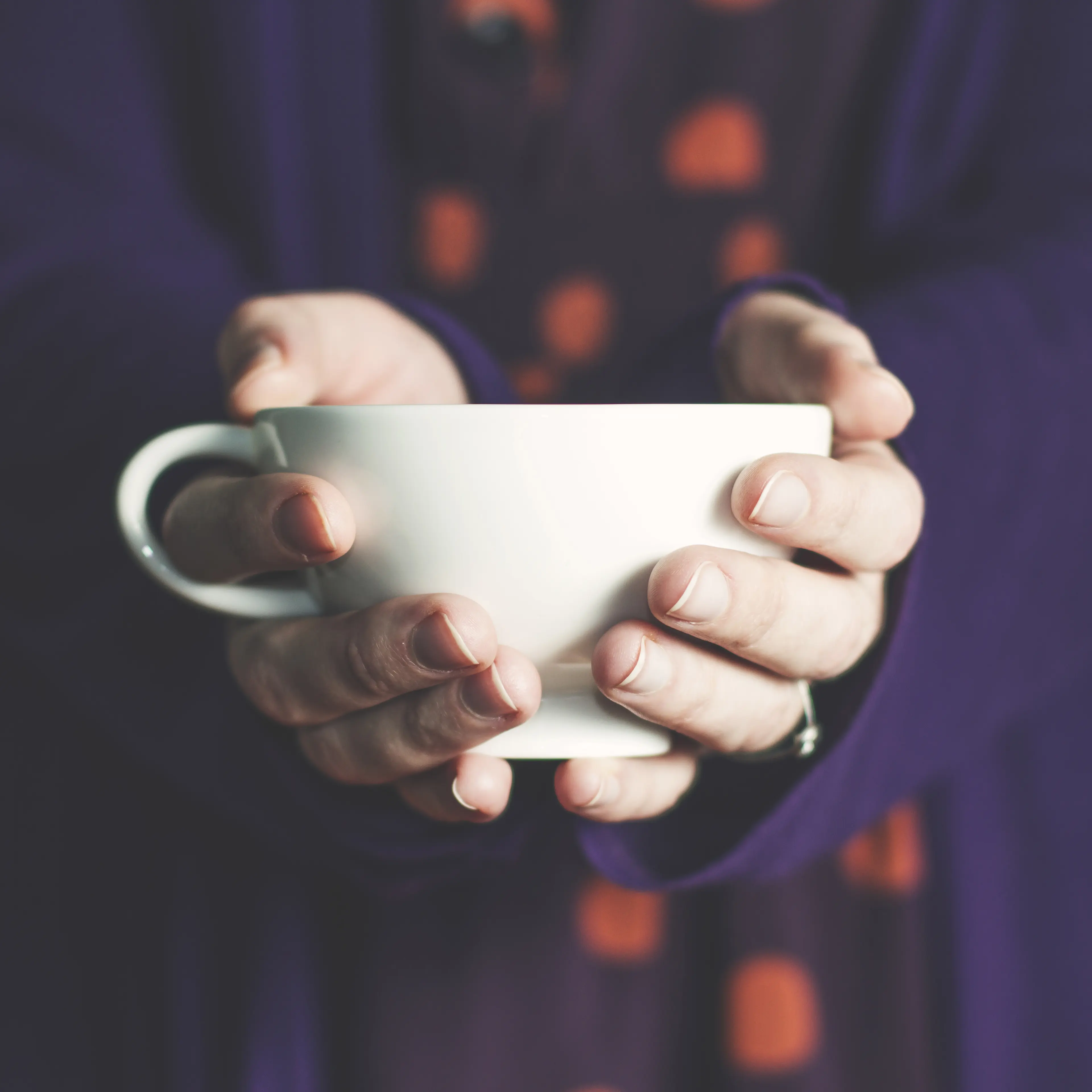 woman-giving-cup