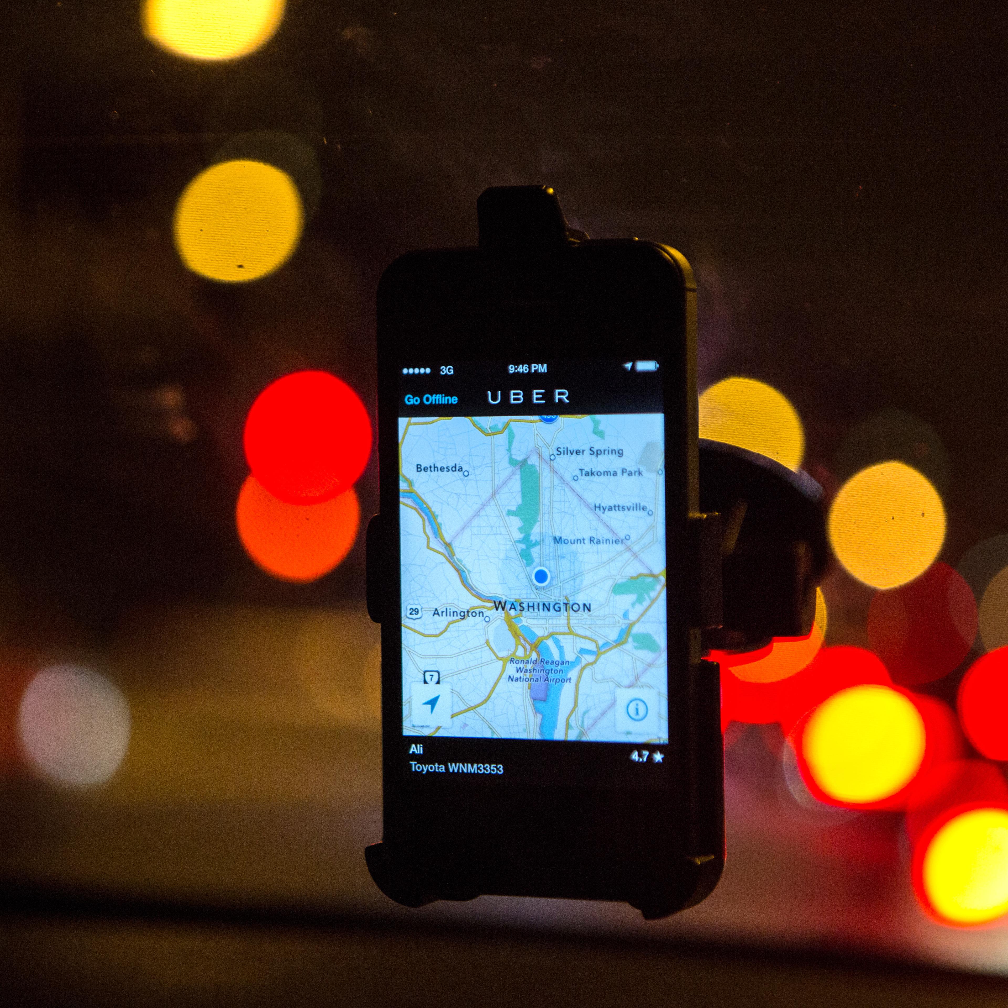 WASHINGTON, DC - APR 4: The Uber driver app on the windshield