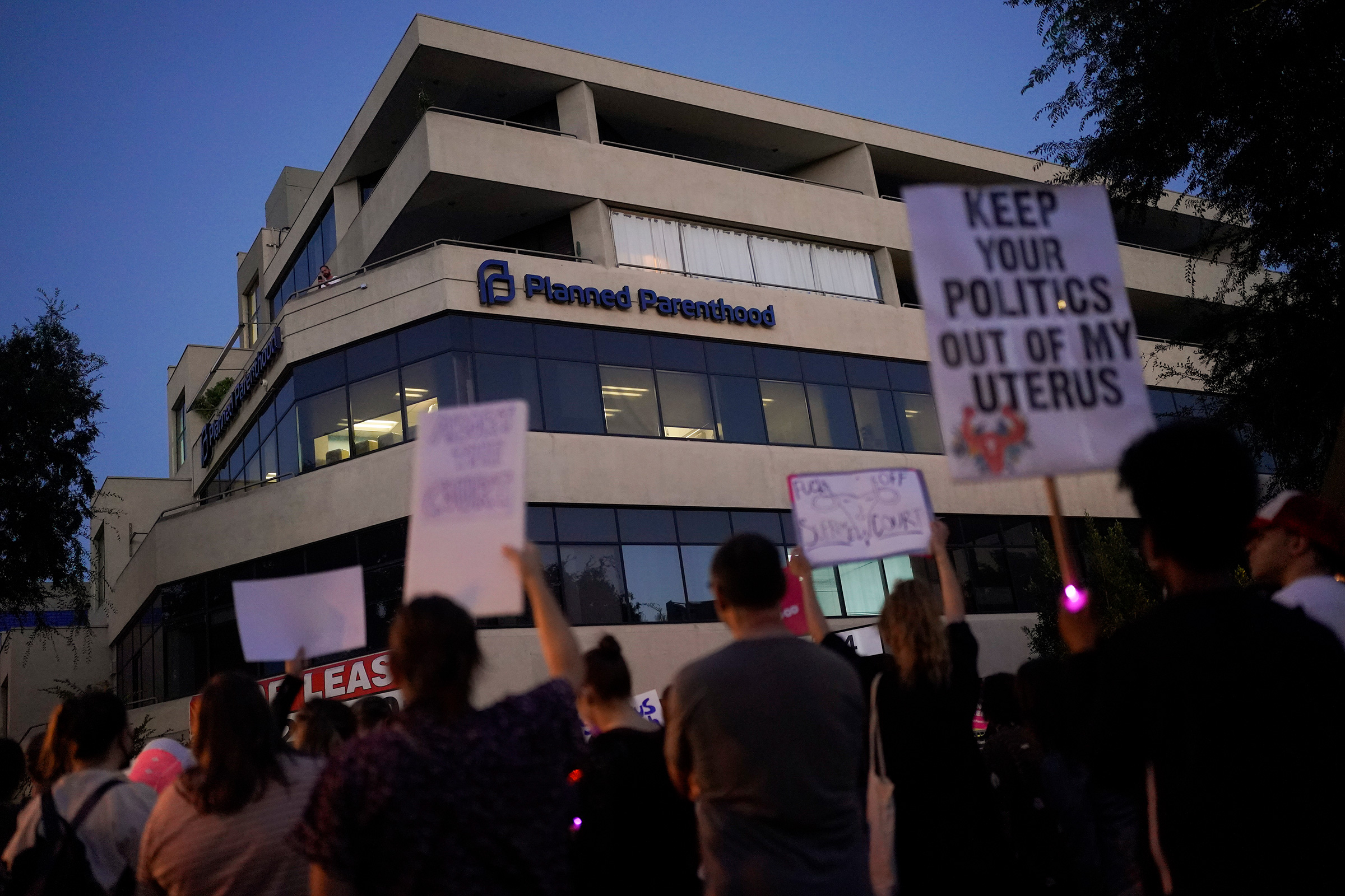 Supporters of abortion rights cheer outside a Planned Parenthood clinic in West Hollywood, Calif., June 24, 2022.