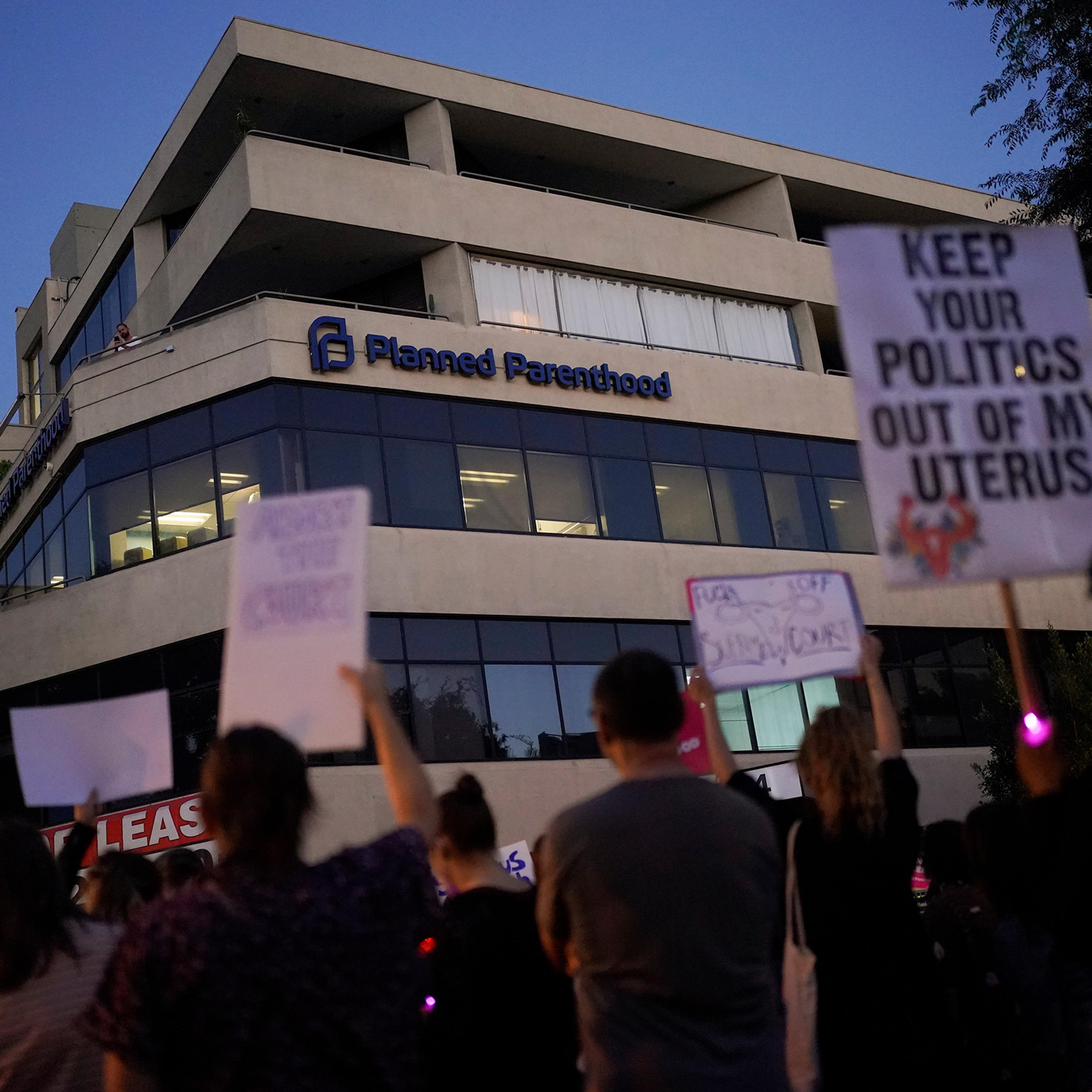 Supporters of abortion rights cheer outside a Planned Parenthood clinic in West Hollywood, Calif., June 24, 2022.