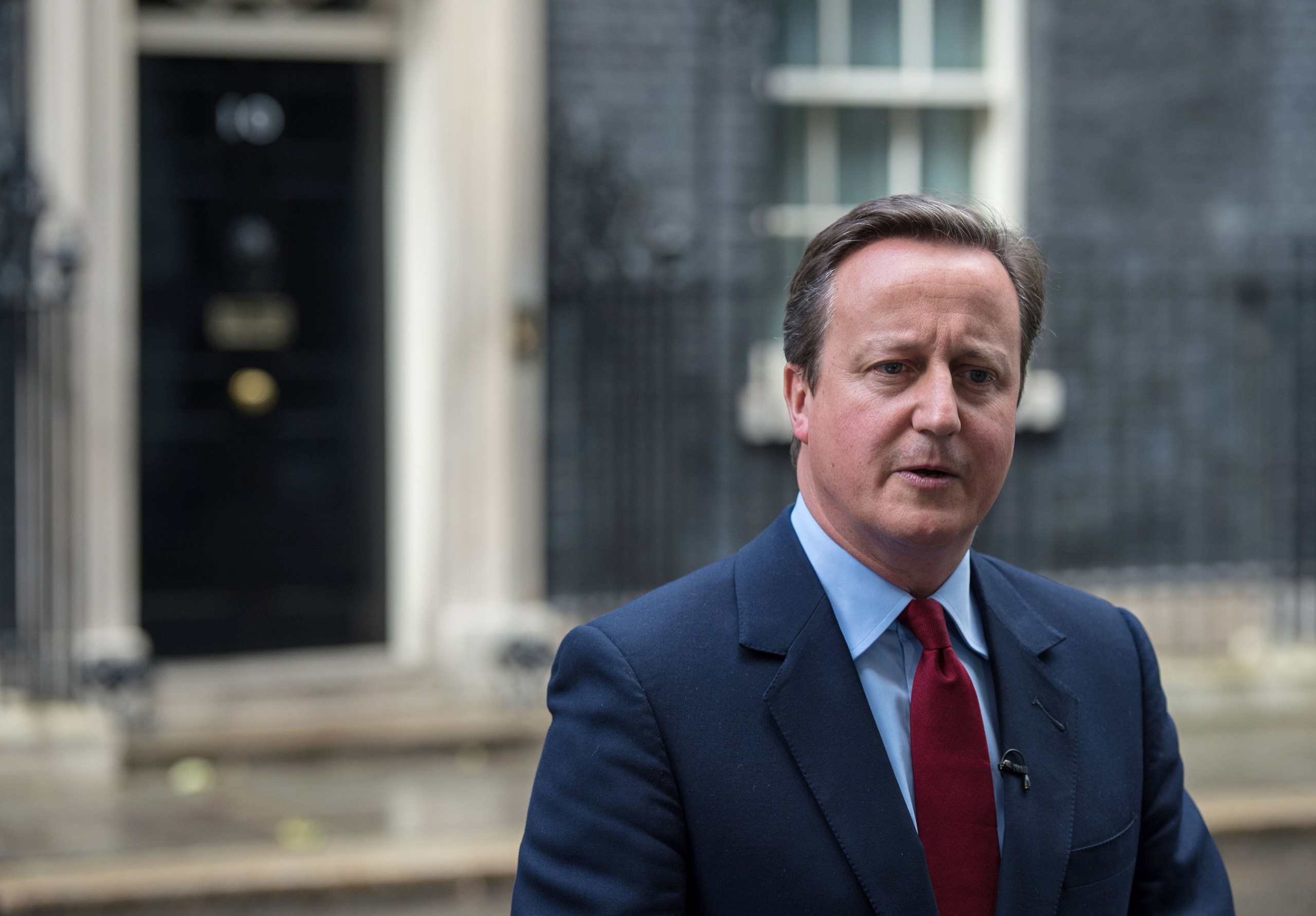 British Prime Minister David Cameron addresses the media outside 10 Downing Street in London on July 11, 2016.