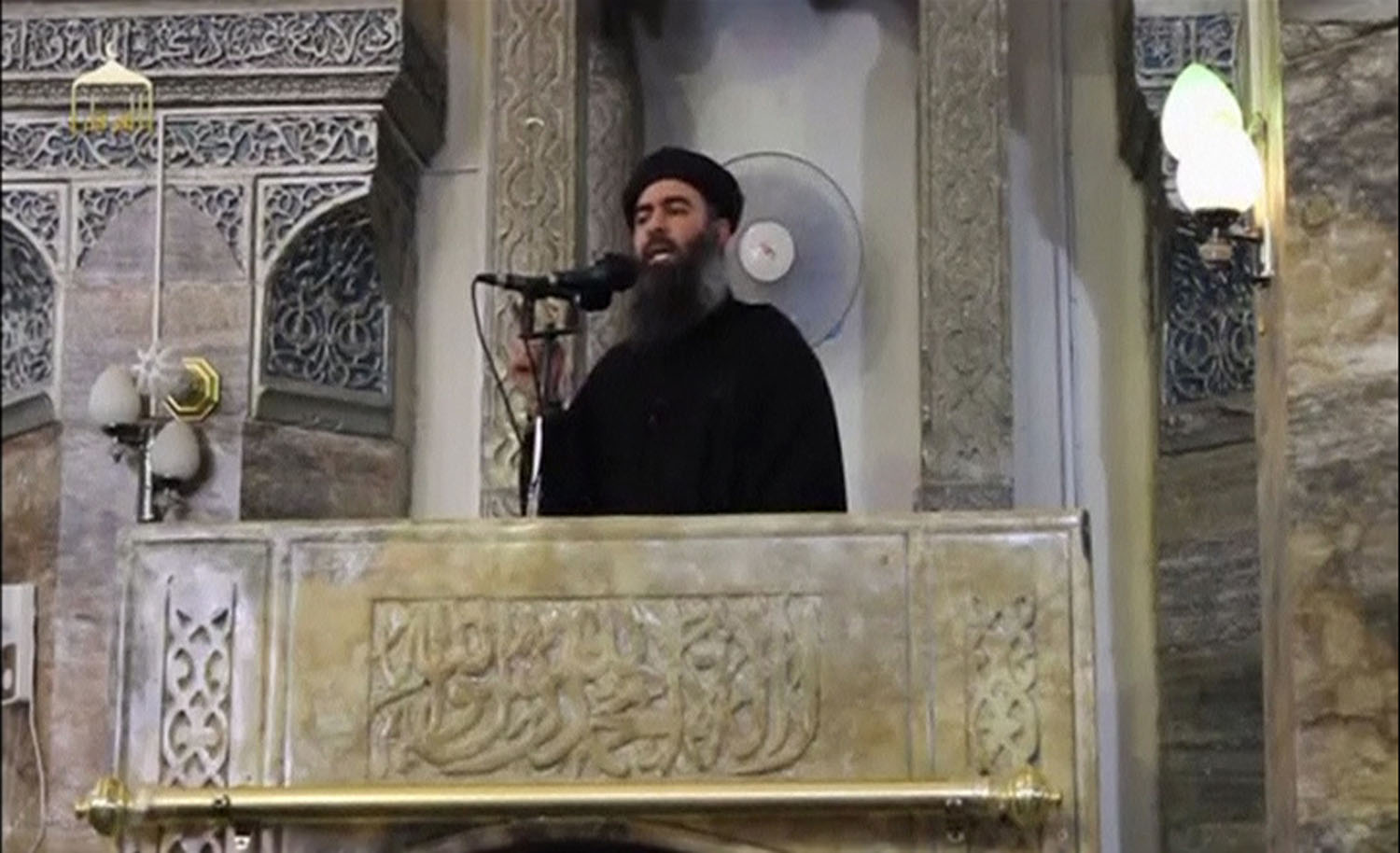 A man purported to be the reclusive leader of the militant Islamic State Abu Bakr al-Baghdadi in Mosul, Iraq, in 2014.