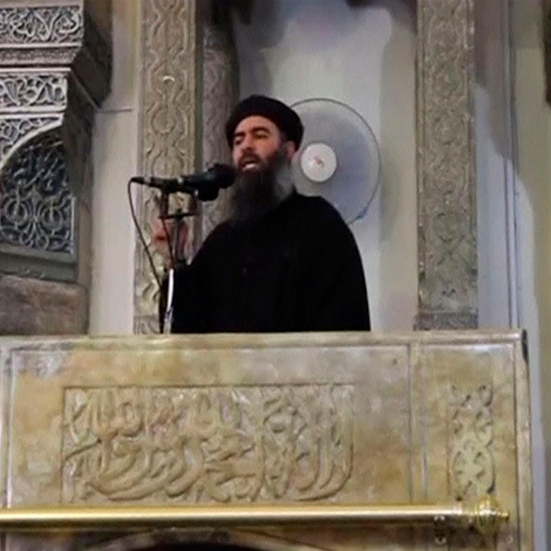 A man purported to be the reclusive leader of the militant Islamic State Abu Bakr al-Baghdadi in Mosul, Iraq, in 2014.