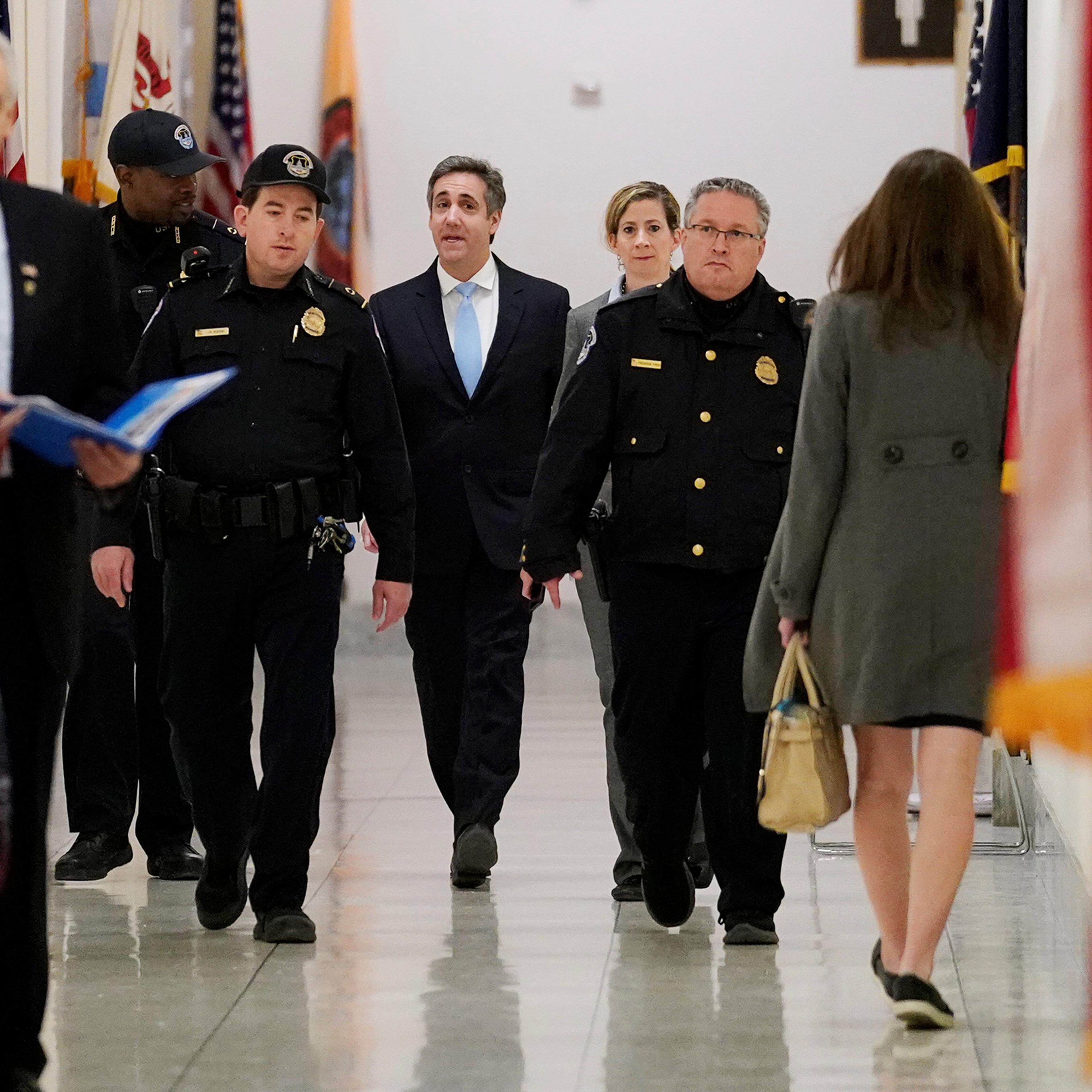 Michael Cohen arrives to testify at a House Committee on Oversight and Reform hearing on Capitol Hill in Washington, Feb. 27, 2019.