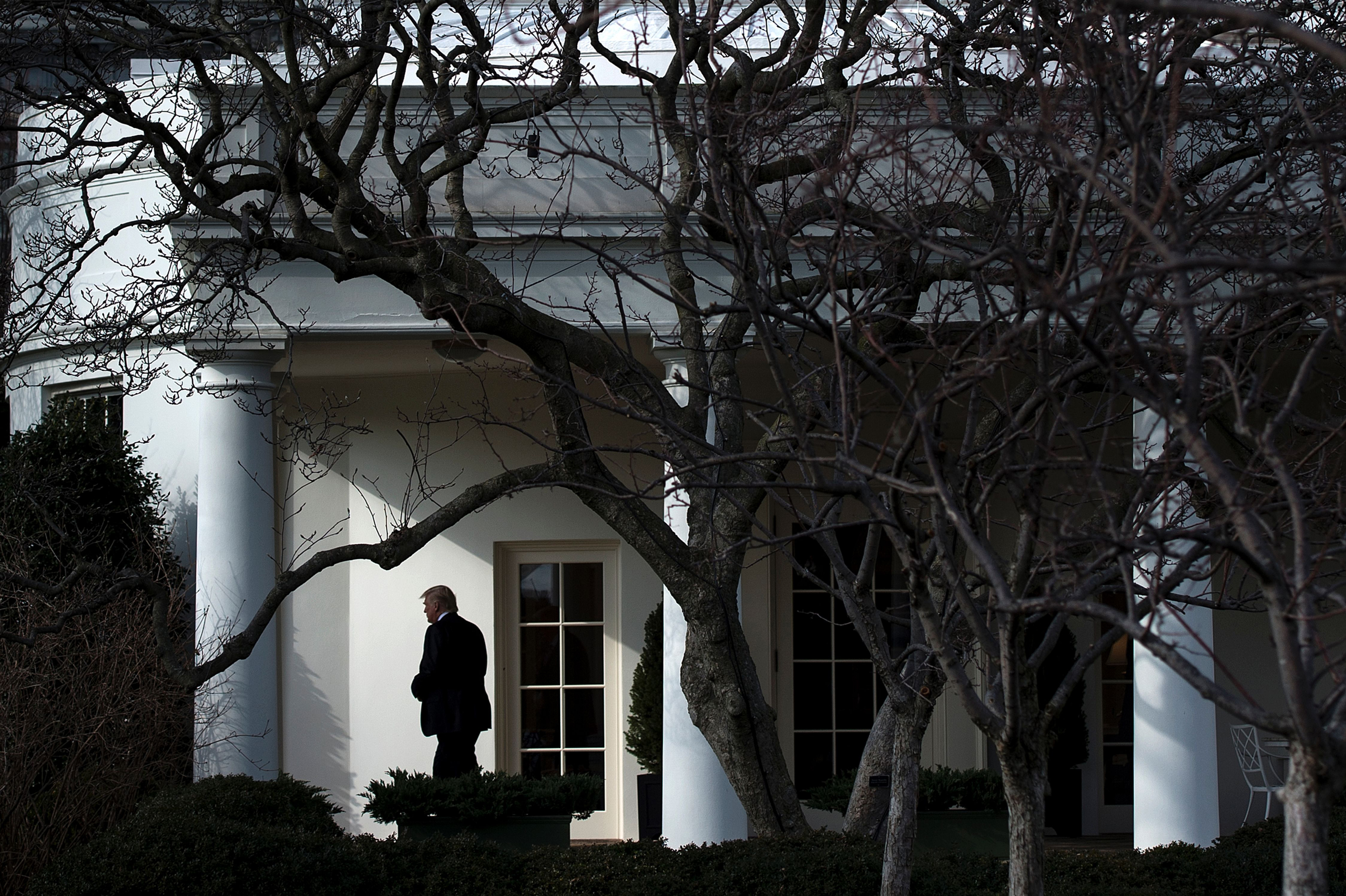 TOPSHOT - US President Donald Trump walks to Marine One for his first trip as President, on the South Lawn of the White House January 26, 2017 in Washington, DC. / AFP / Brendan Smialowski (Photo credit should read BRENDAN SMIALOWSKI/AFP/Getty Images