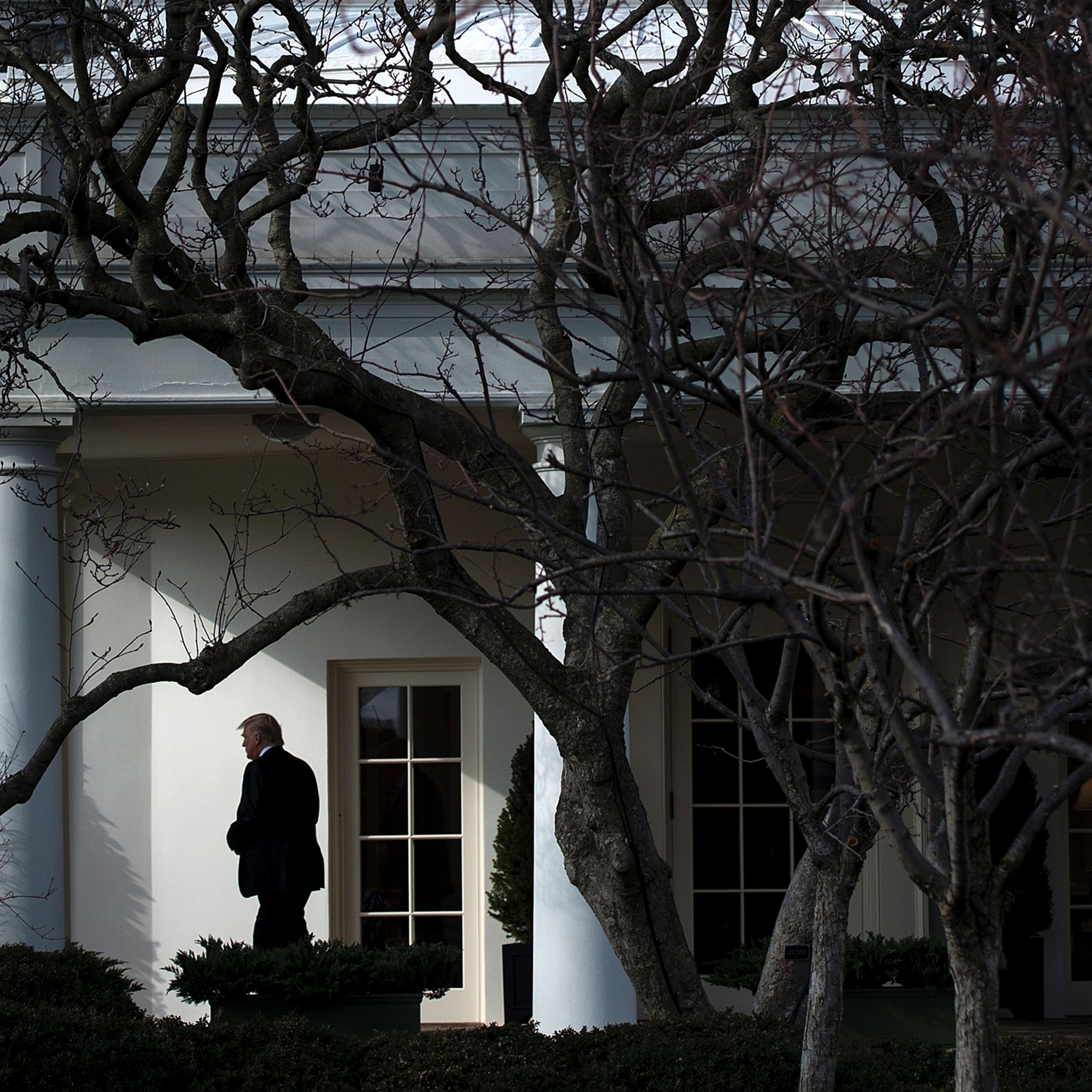 TOPSHOT - US President Donald Trump walks to Marine One for his first trip as President, on the South Lawn of the White House January 26, 2017 in Washington, DC. / AFP / Brendan Smialowski (Photo credit should read BRENDAN SMIALOWSKI/AFP/Getty Images