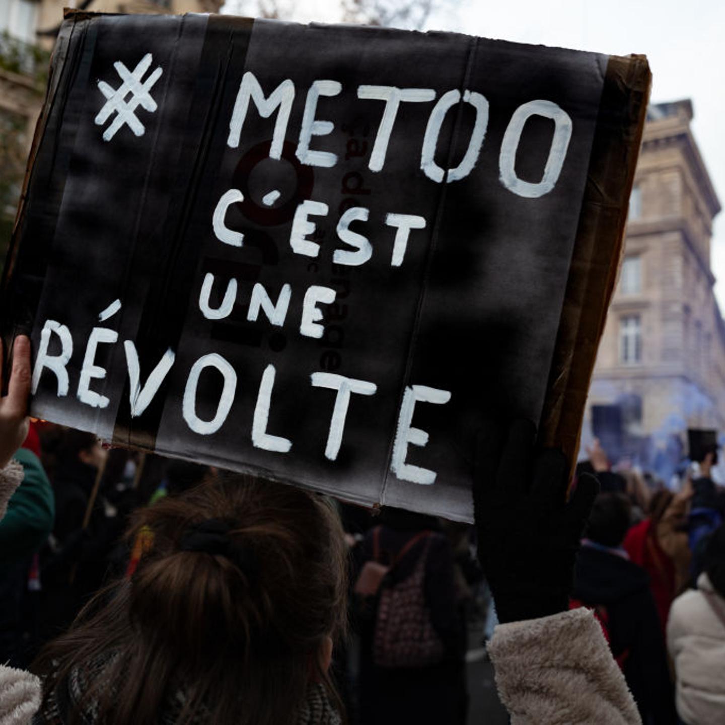 A demonstrator holds a placard reading "#MeToo is a revolt" during a protest to condemn violence against women, called by feminist organizations two days prior to the International Day for the Elimination of Violence against Women, in Paris, France, on November 23, 2024.