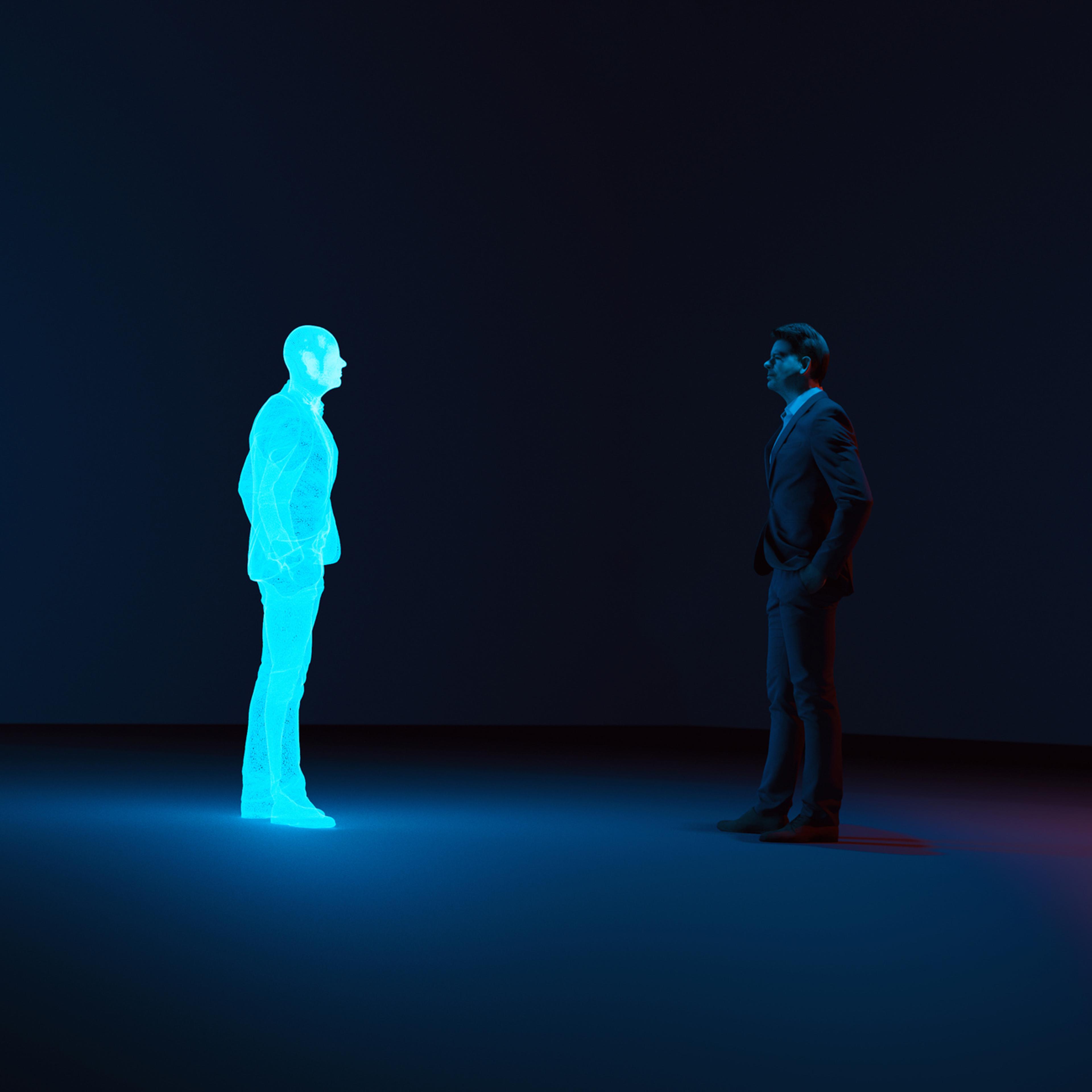 Man meets digital avatar of himself made with a hologram