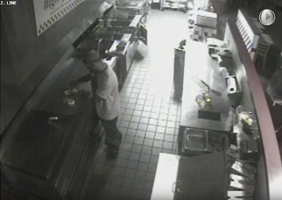 A screengrab from footage captured by security cameras and released by DC's Metropolitan Police Department to seek public help in identifying a burglary suspect during the an incident on March 18, 2016.