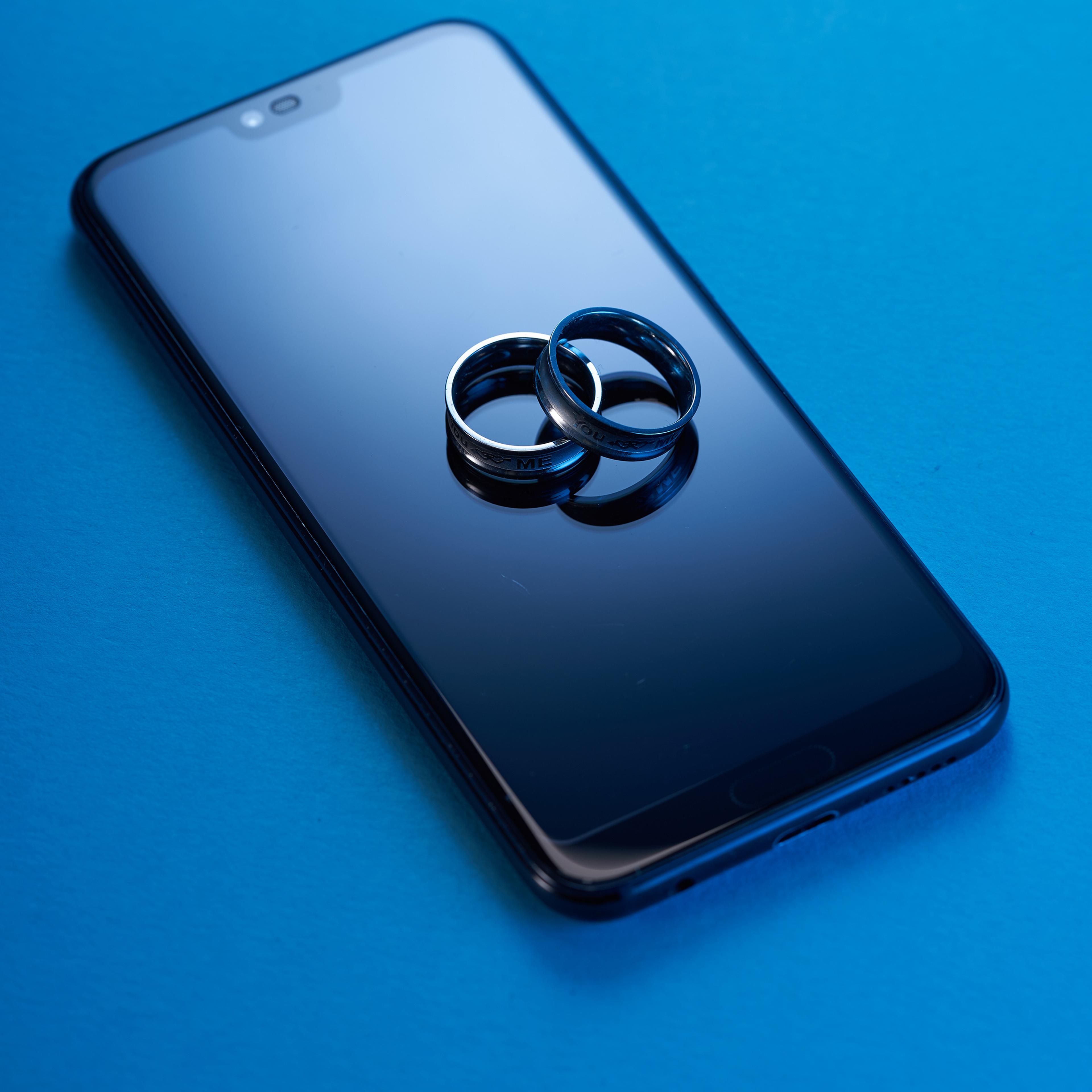 Pair of rings on top of smartphone display
