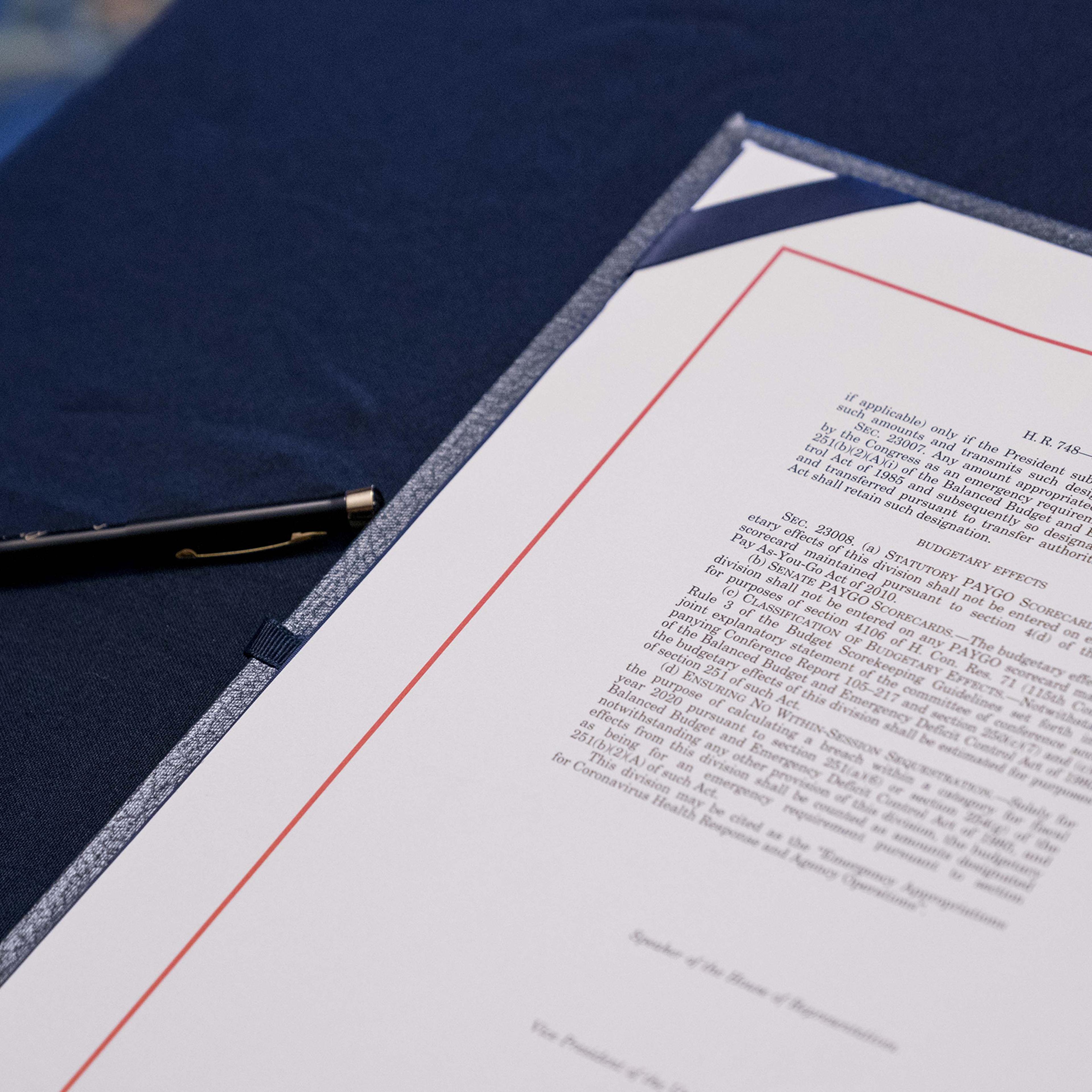 A copy of H.R. 748, Coronavirus Aid, Relief, and Economic Security (CARES) Act, sits on a table before a signing ceremony at the U.S. Capitol in Washington, D.C. on March 27.