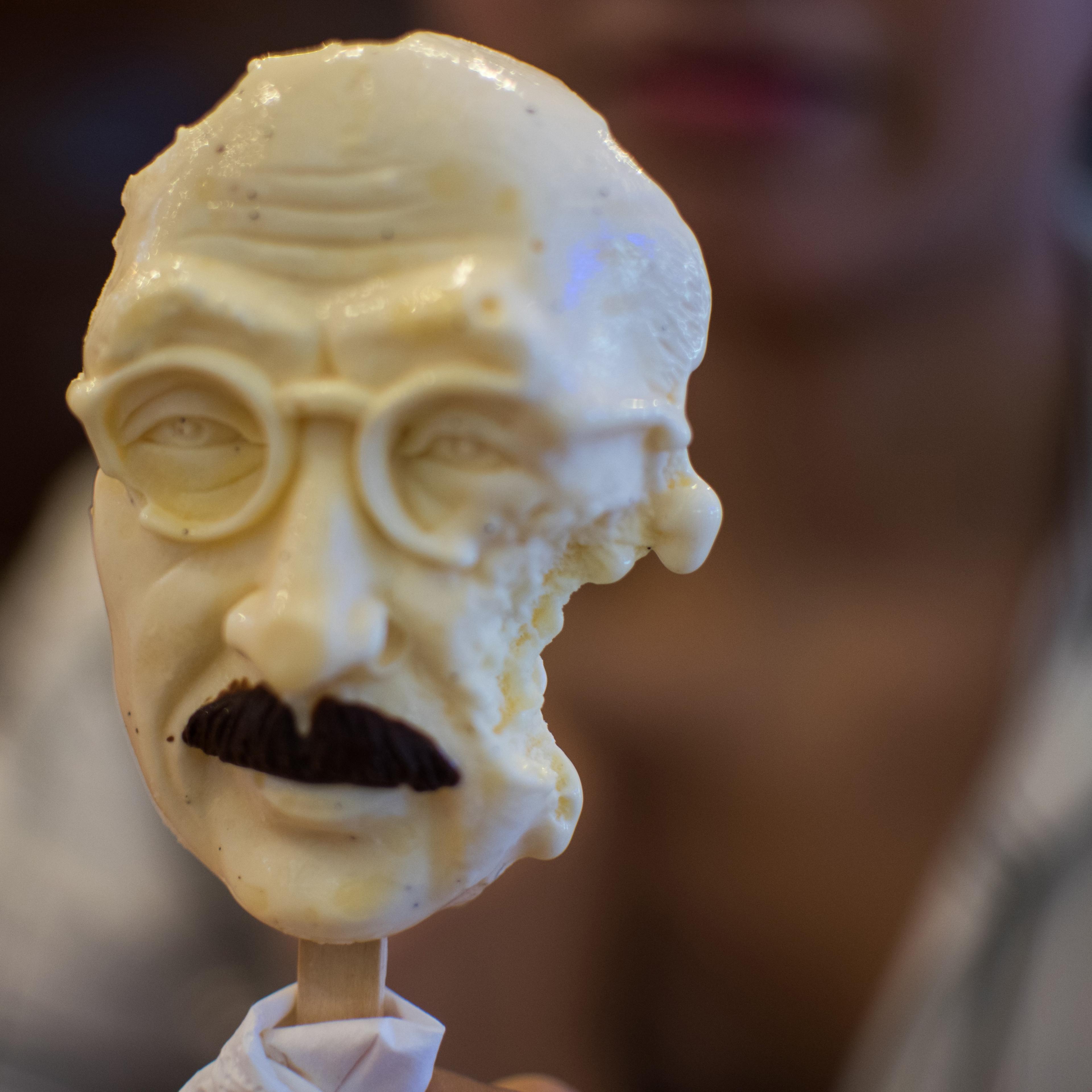 A woman sells an ice cream in the shape of executed Japanese war criminal Hideki Tojo at an ice cream store in Shanghai on September 2, 2015.