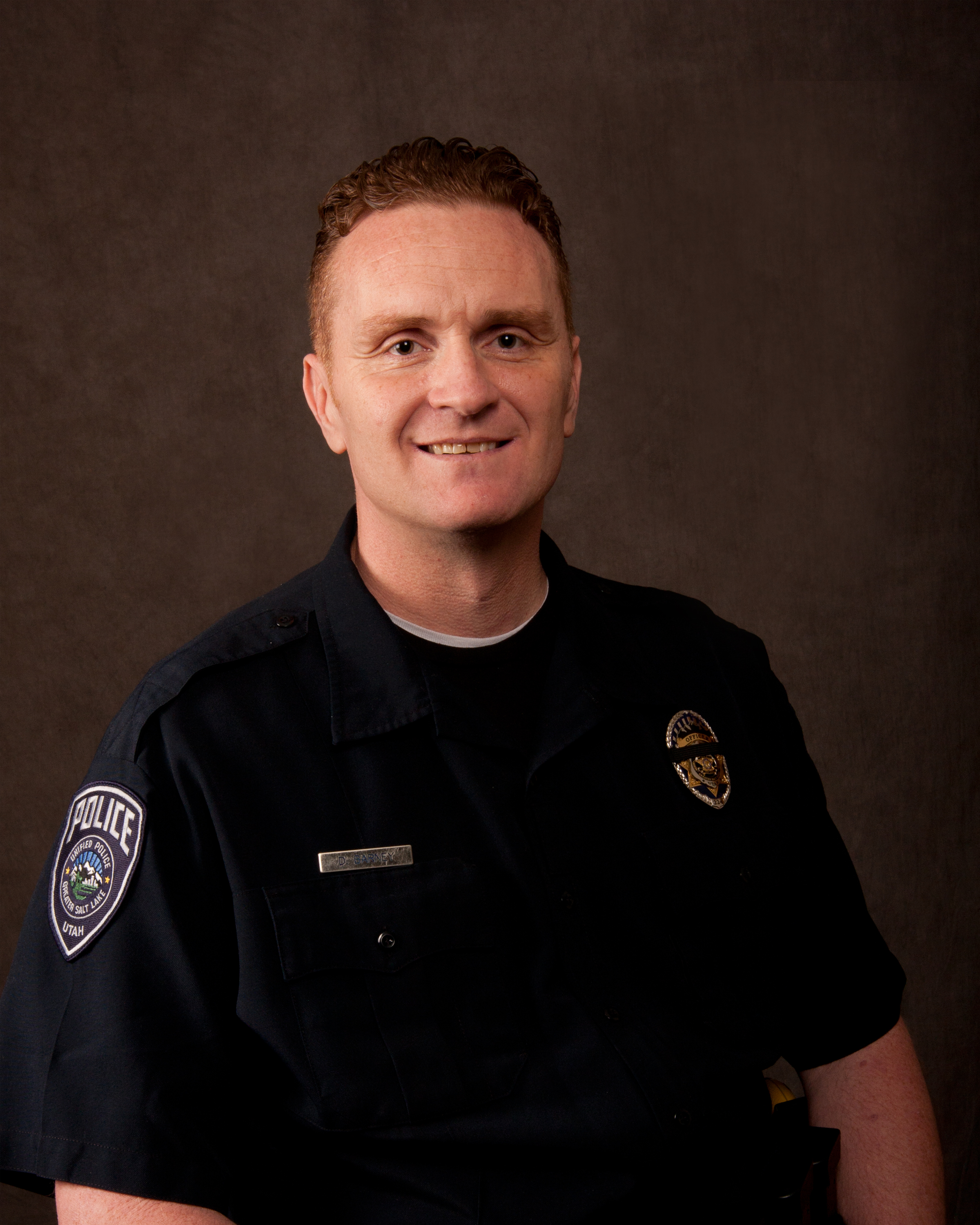This undated photo provided by the Salt Lake County Sheriff's Office shows, Utah police officer, Douglas Barney.