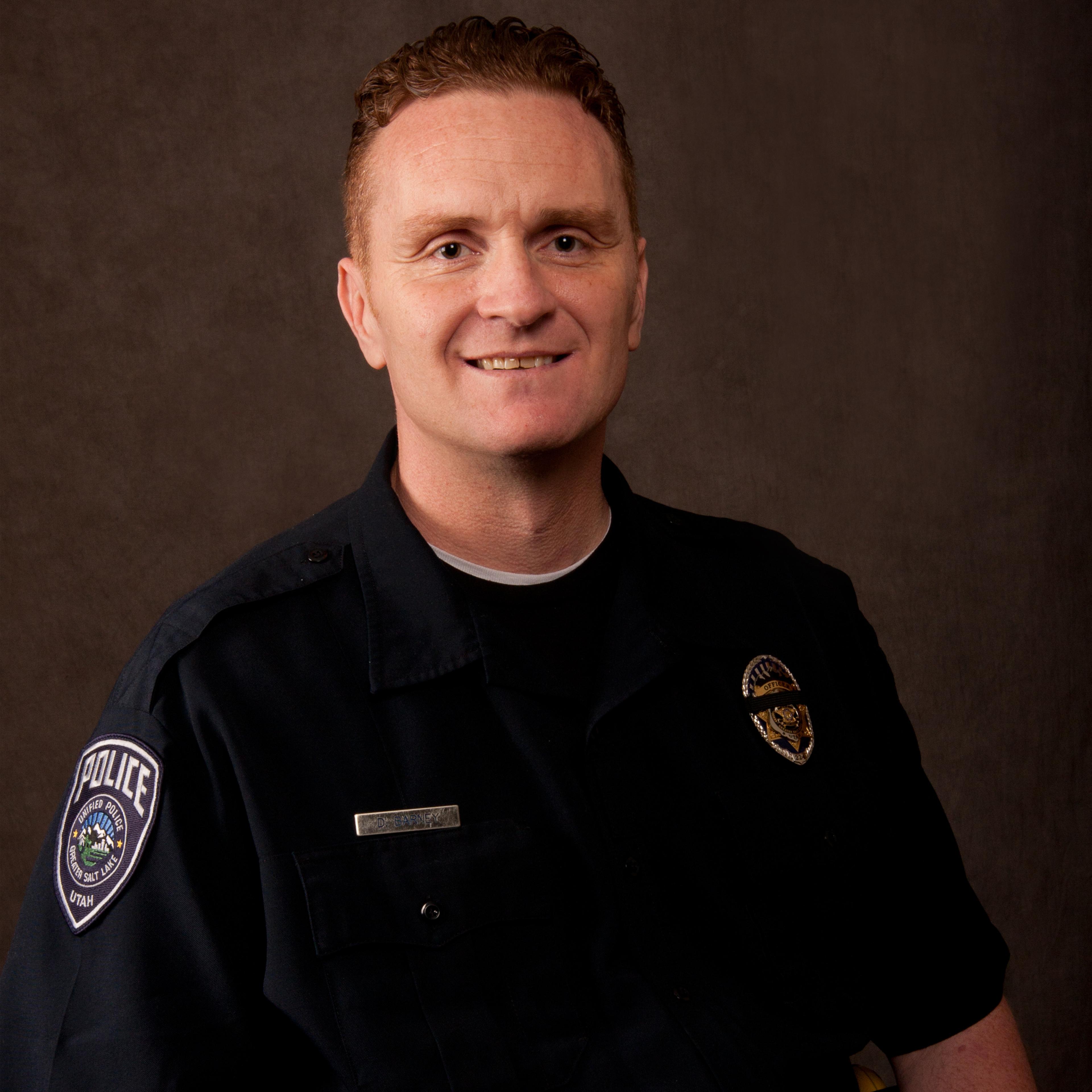 This undated photo provided by the Salt Lake County Sheriff's Office shows, Utah police officer, Douglas Barney.