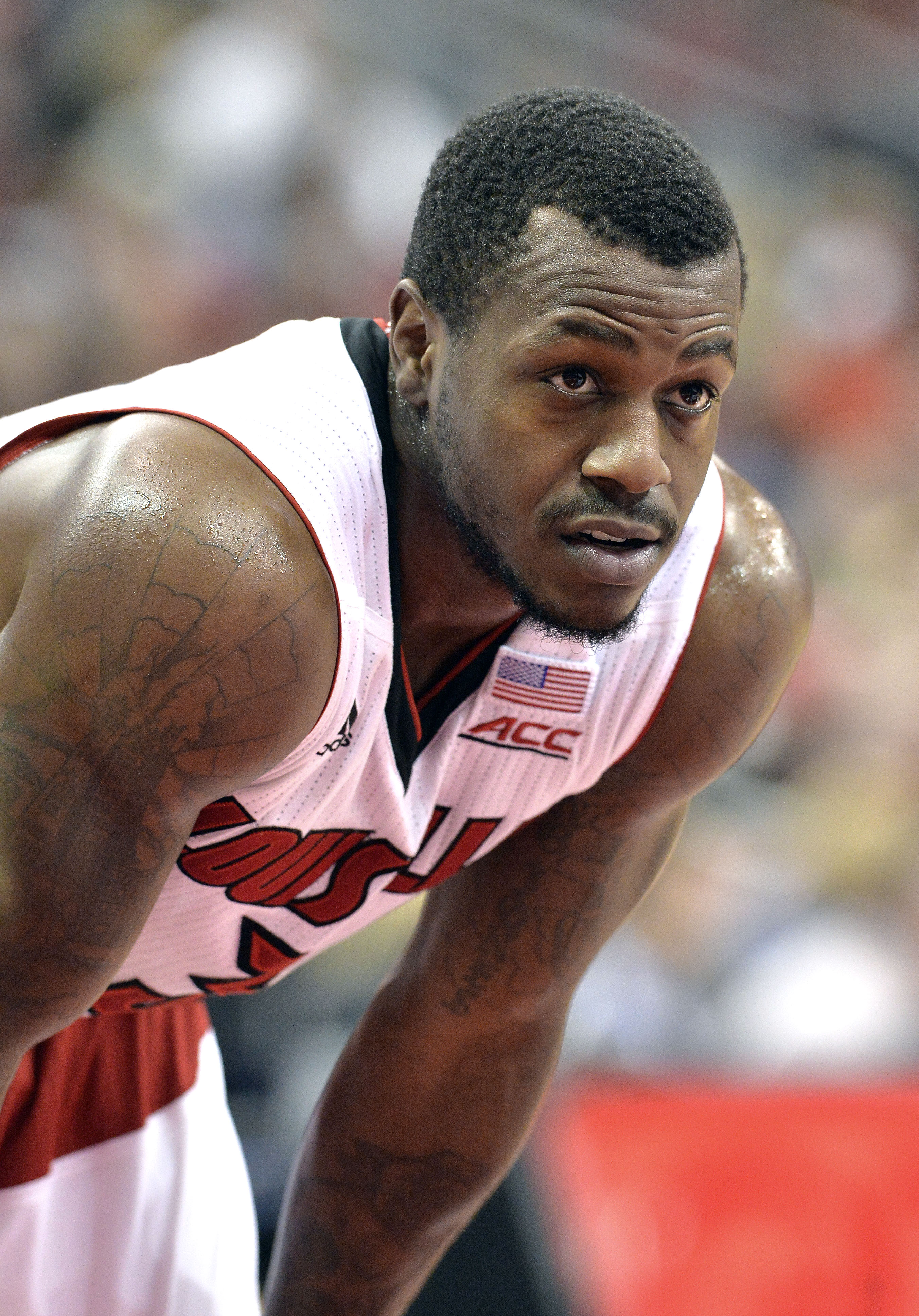 Former Louisville guard Chris Jones in action during the first half of an NCAA college basketball game against Miami in Louisville, Ky. on Feb. 21, 2015.